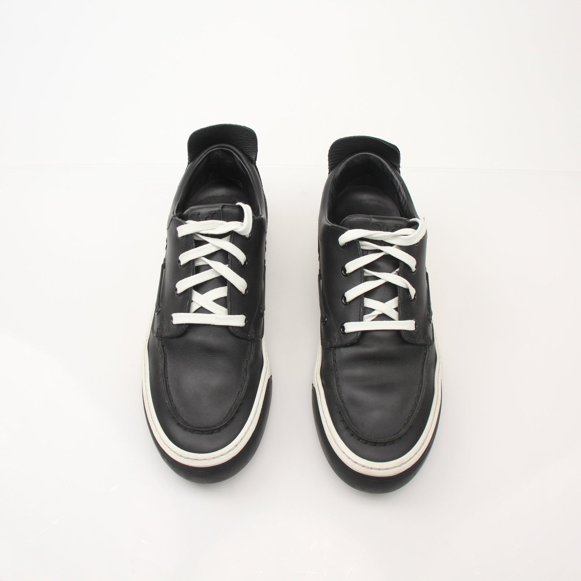 Gold & Beyond Louis Vuitton Damier low top sneakers, stylish shoes with signature checkered pattern and white rubber soles.