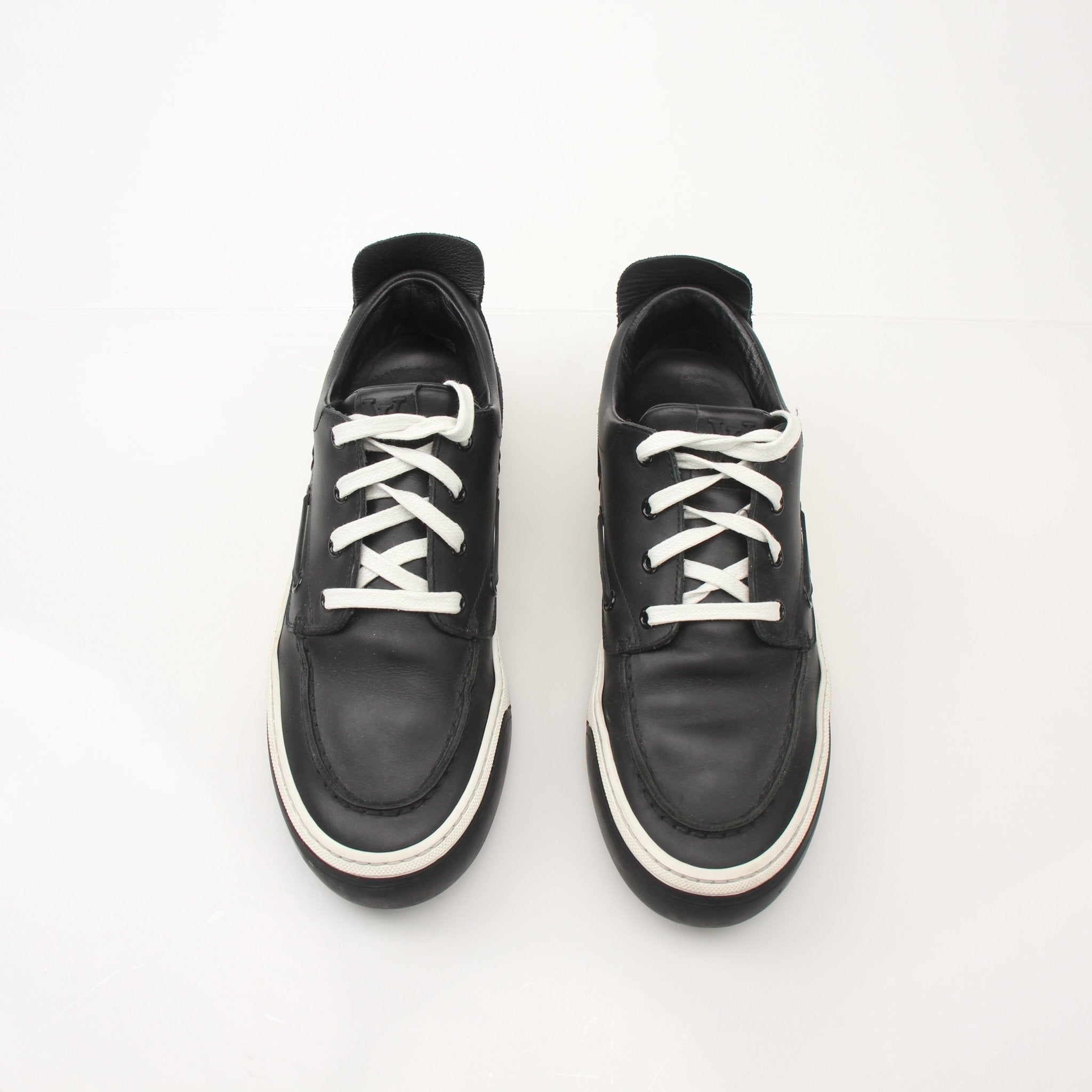 Gold & Beyond Louis Vuitton Damier low top sneakers, stylish shoes with signature checkered pattern and white rubber soles.