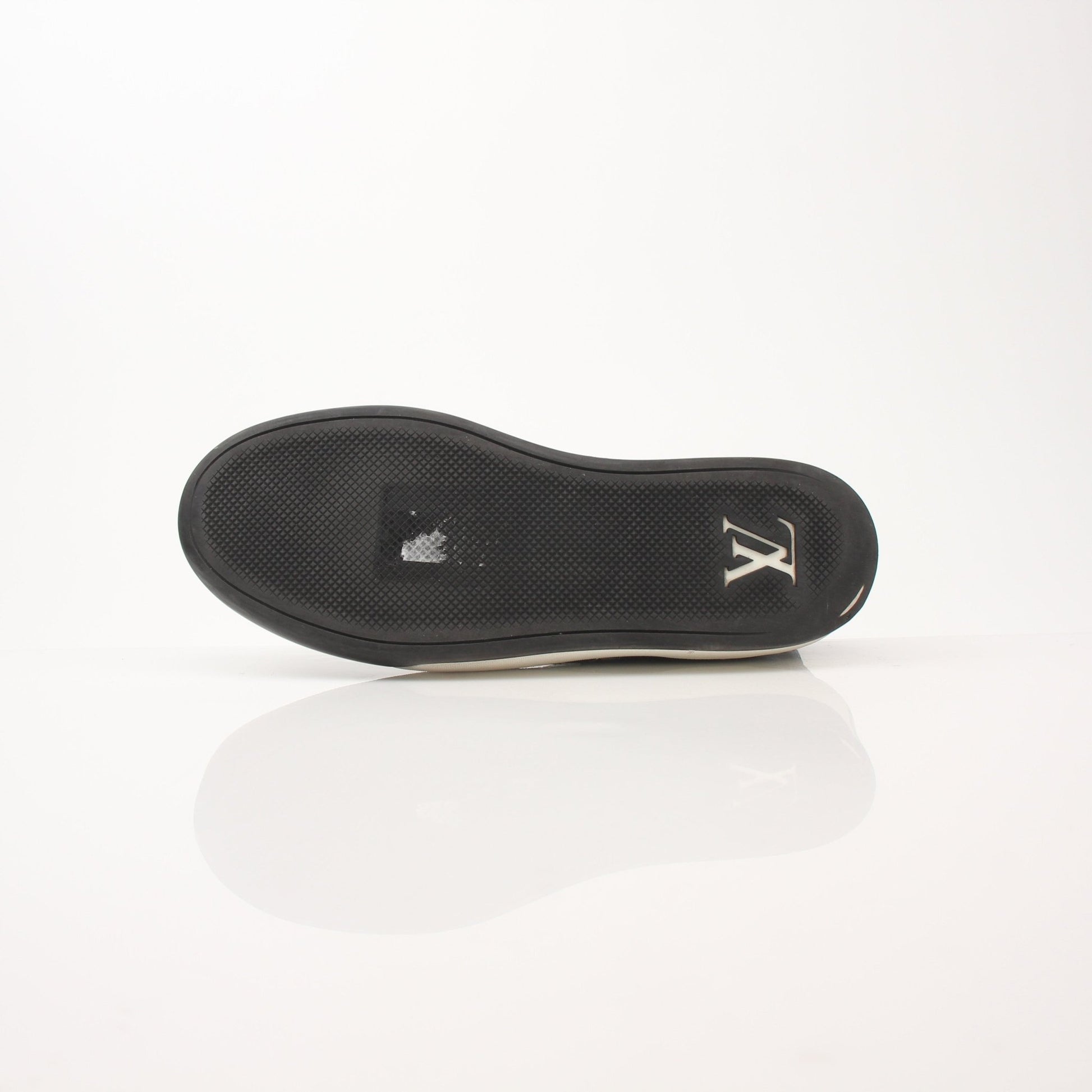 Louis Vuitton Damier Low Top Sneakers by Gold & Beyond, featuring classic checkerboard pattern and casual shoe design.