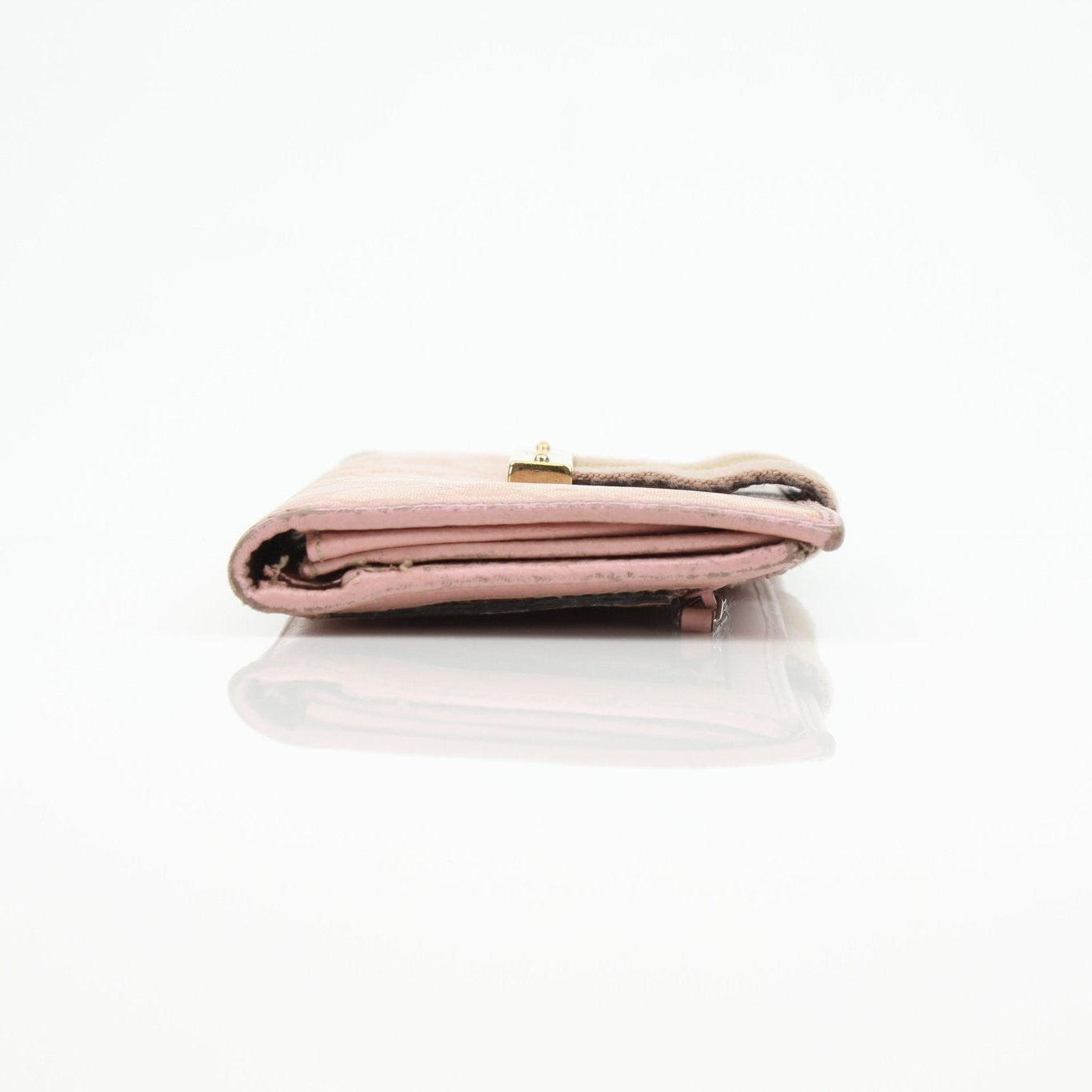 Pink Gucci GG Continental wallet with gold accents, showcasing the classic monogram and elegant leather design.