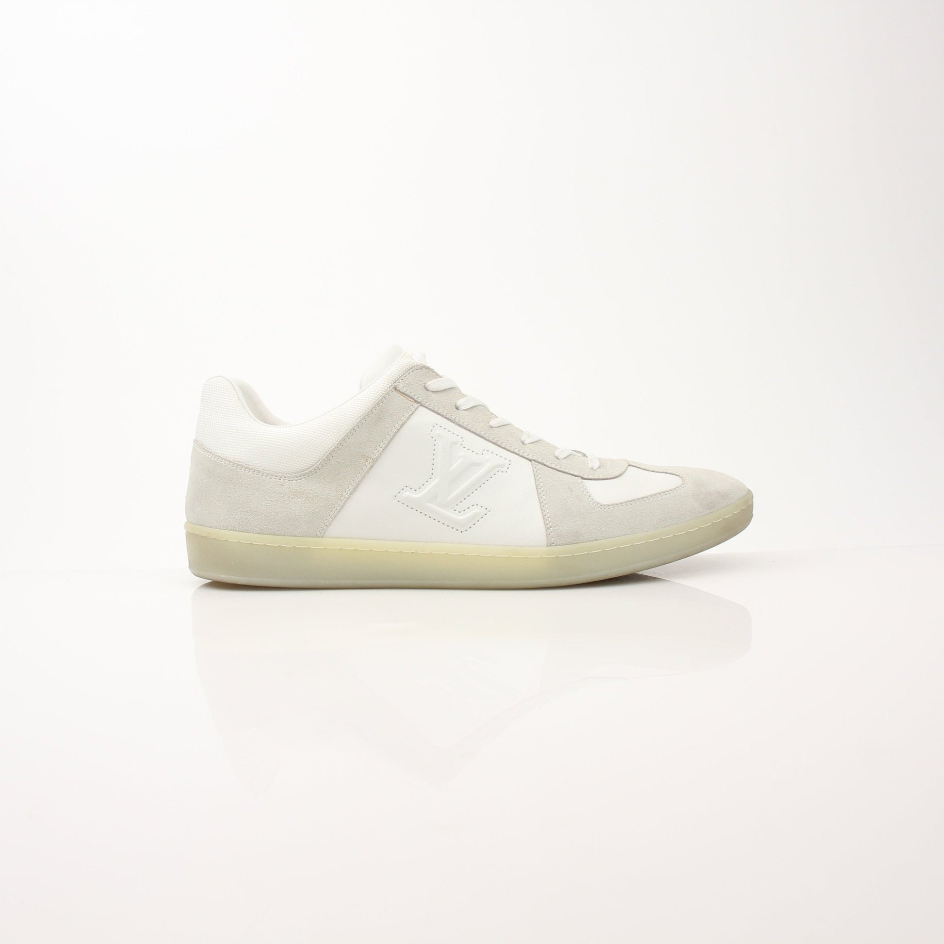 White Louis Vuitton low top sneakers by Gold & Beyond, featuring stylish design and casual footwear for everyday wear.