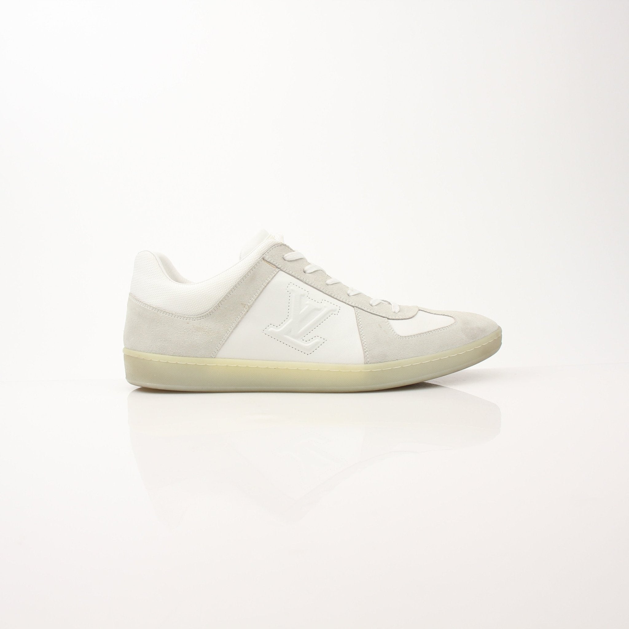 White Louis Vuitton low top sneakers by Gold & Beyond, featuring stylish design and casual footwear for everyday wear.