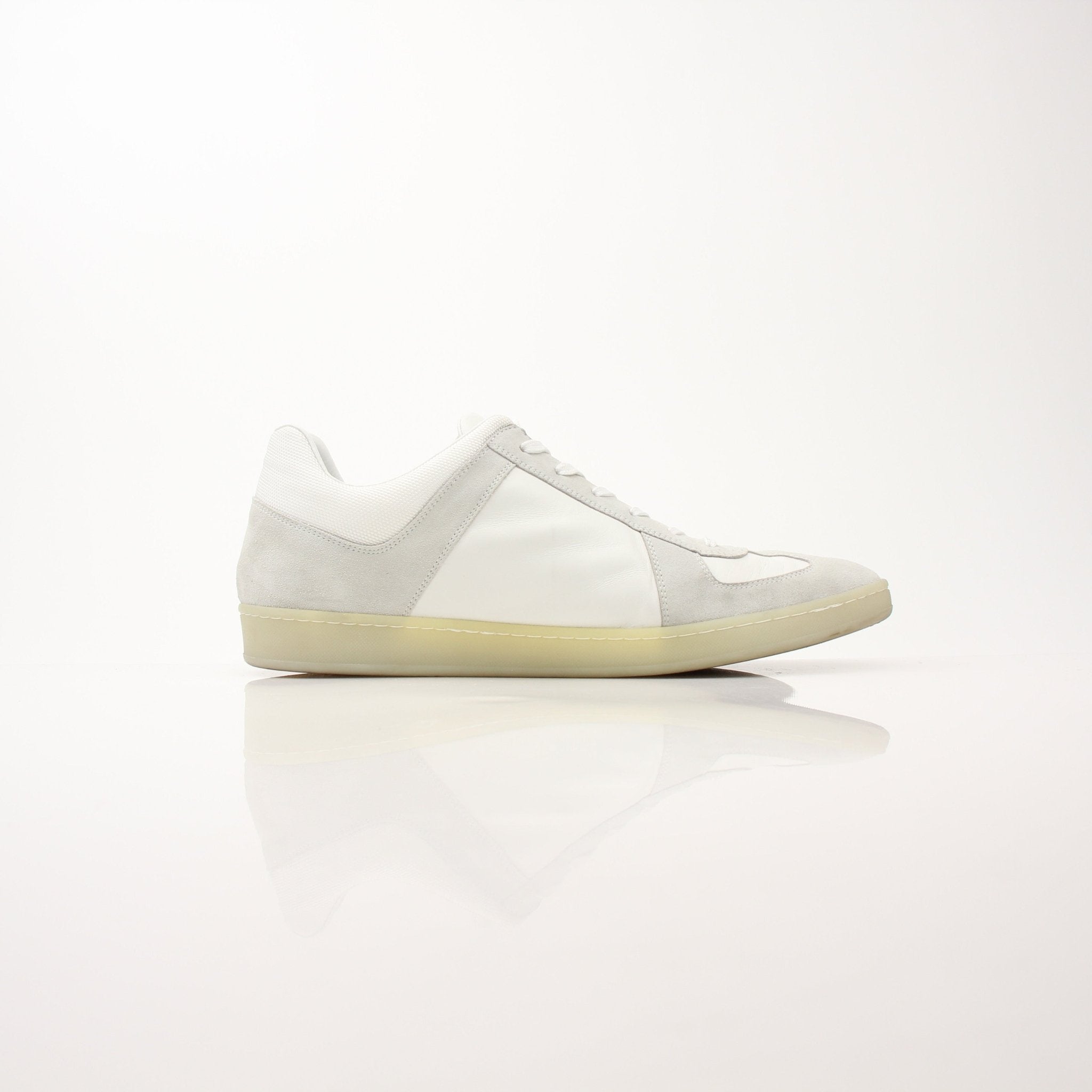 Gold & Beyond white low top sneakers with Louis Vuitton branding, casual shoes with clean design and white laces.