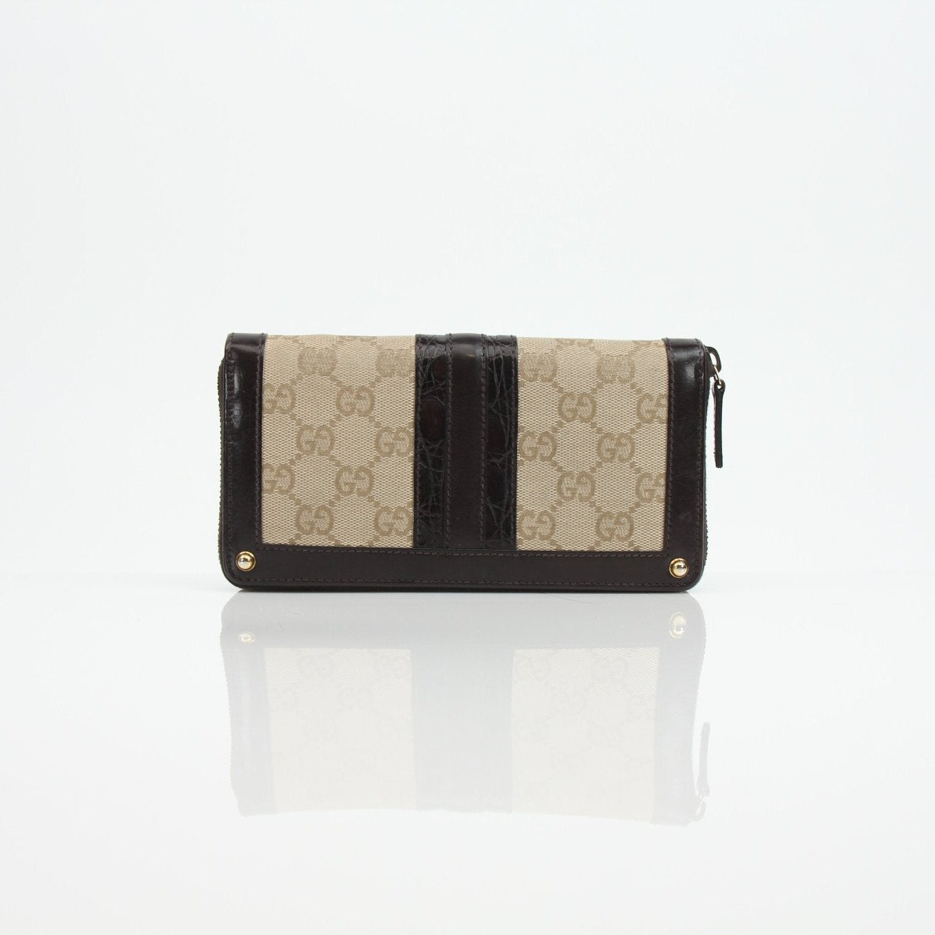 Gucci crocodile canvas wallet by Gold & Beyond, featuring a sleek design with crocodile pattern and multiple card slots.