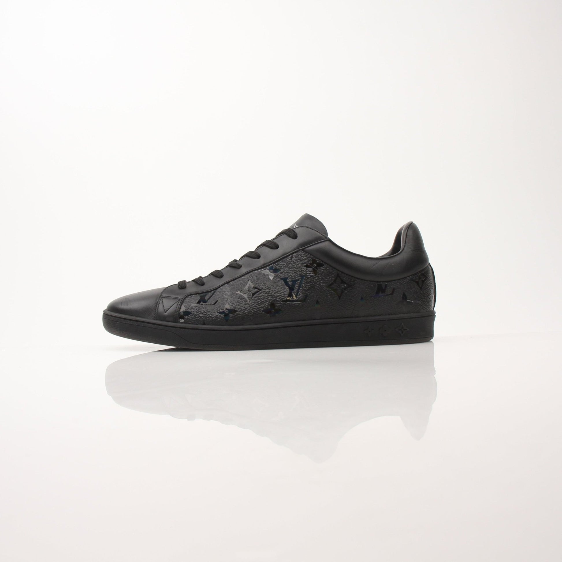 Gold & Beyond Louis Vuitton Luxembourg Sneakers, stylish shoes with signature LV design, white and brown color, displayed on a neutral background.
