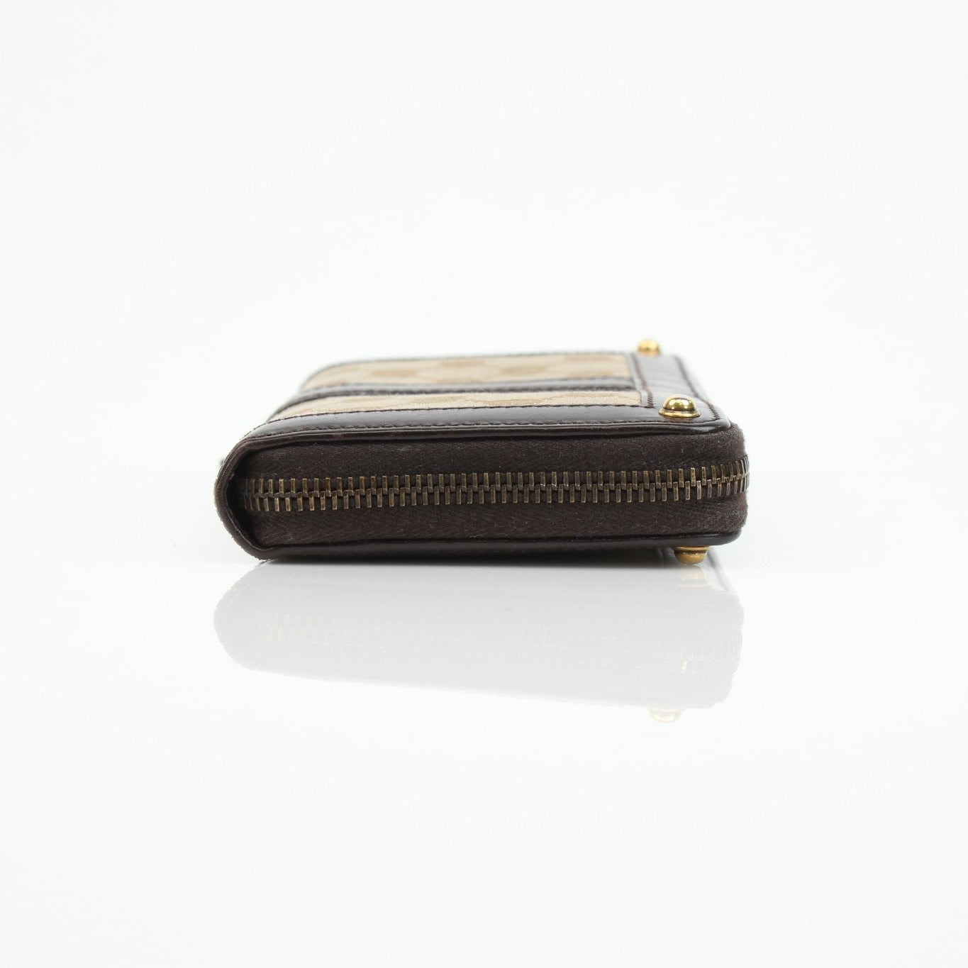 Gucci crocodile canvas wallet by Gold & Beyond displaying crocodile pattern, leather trim, and multiple card slots.