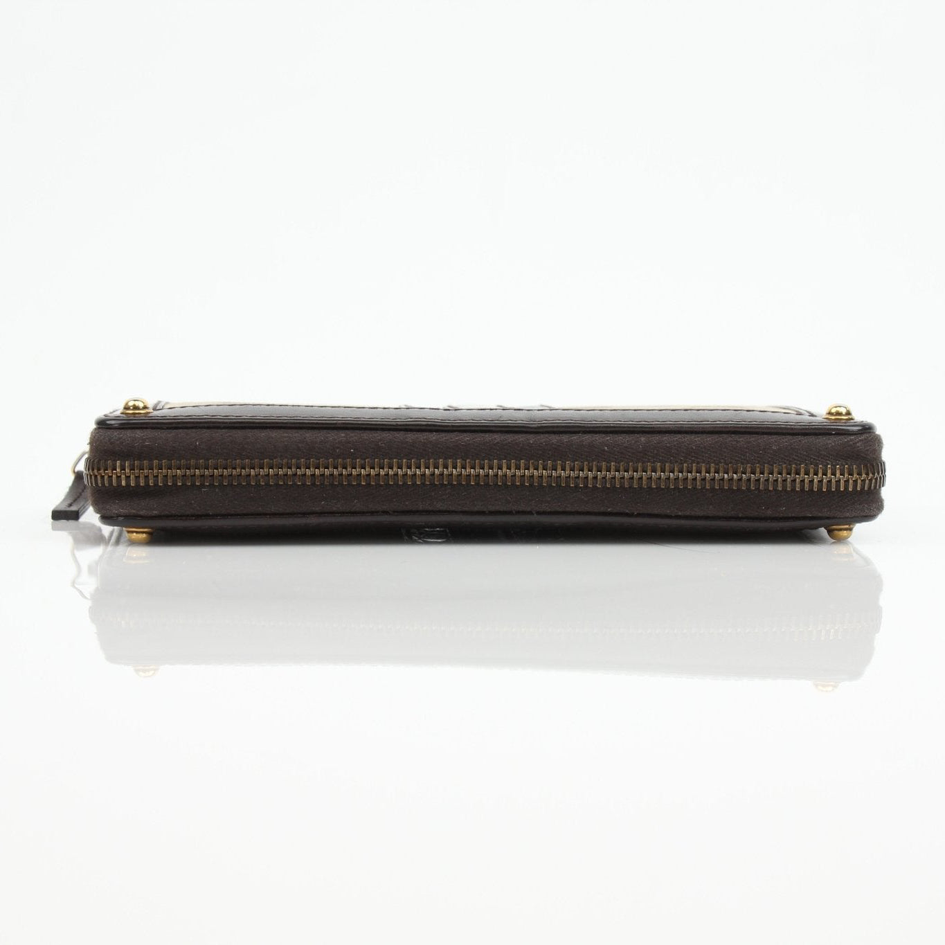 Gold & Beyond Gucci crocodile canvas wallet showing textured crocodile pattern and sleek wallet design.