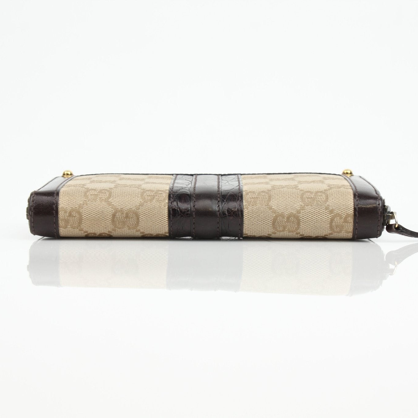 Gold & Beyond Gucci crocodile canvas wallet showing textured crocodile pattern and sleek leather trim.