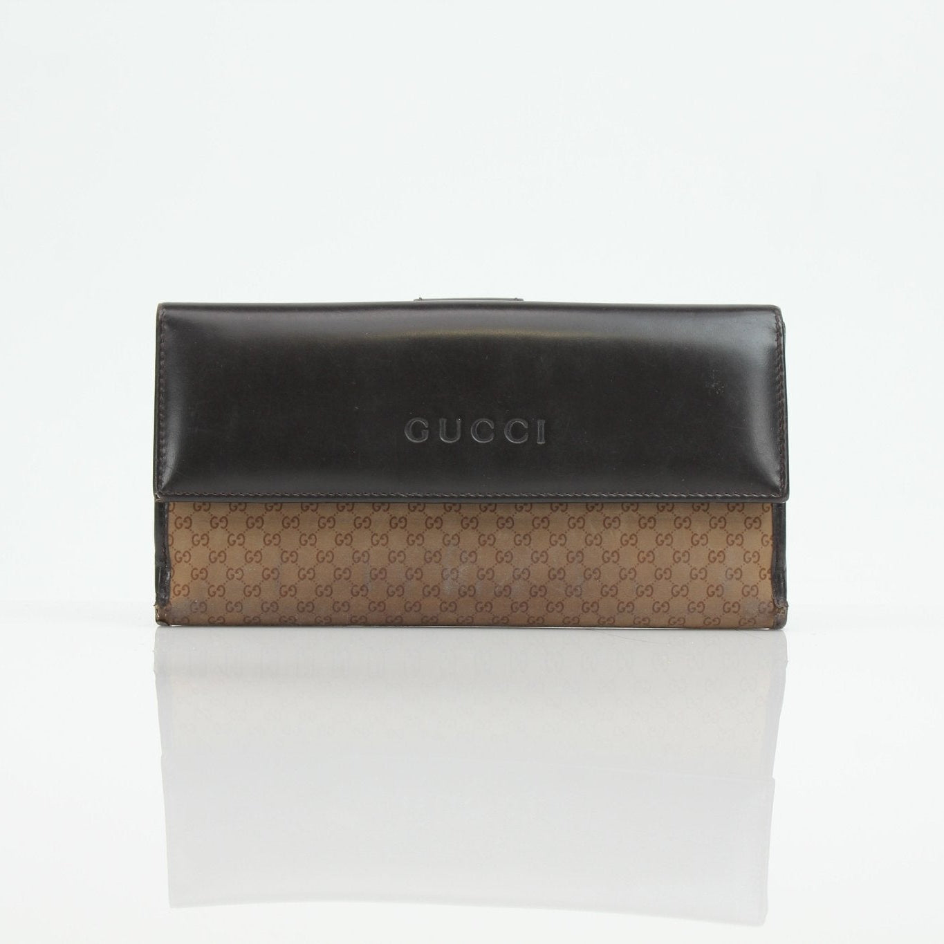 Gucci Guccissima canvas wallet by Gold & Beyond, featuring the signature pattern and compact design for everyday use.