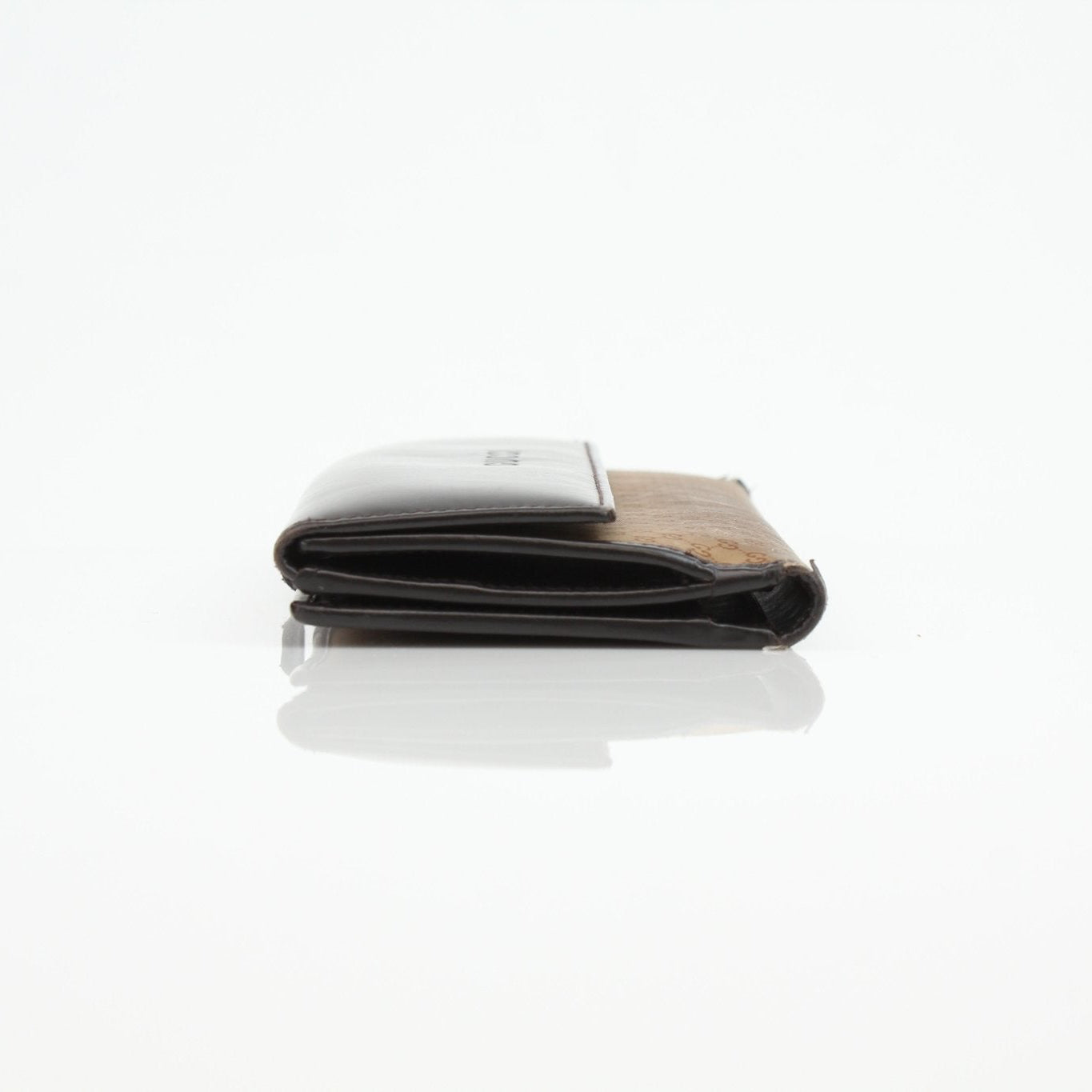 Gucci Guccissima canvas wallet by Gold & Beyond, featuring the signature monogram pattern and leather trim.