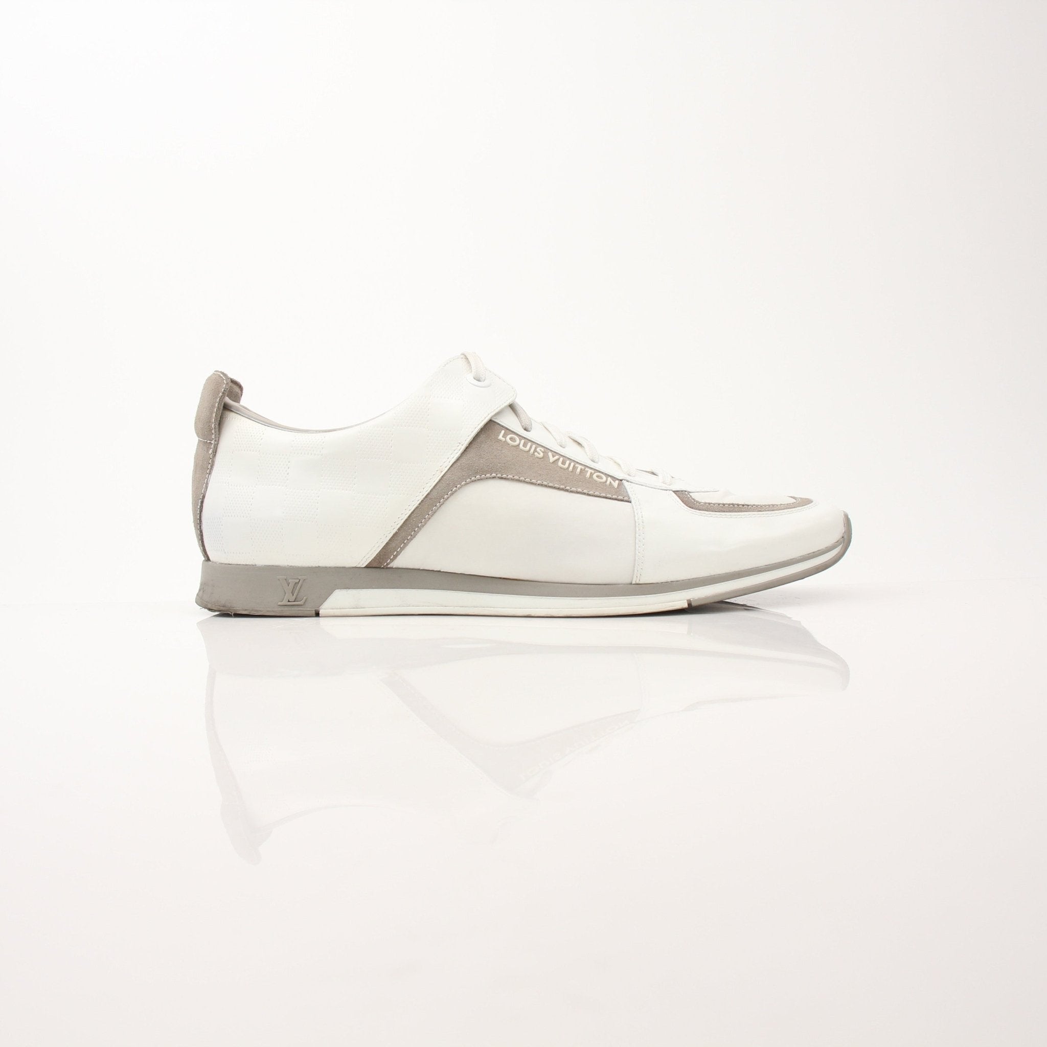 Louis Vuitton Damier Trainers shoes with classic checkered pattern and white soles, stylish and comfortable footwear by Gold & Beyond