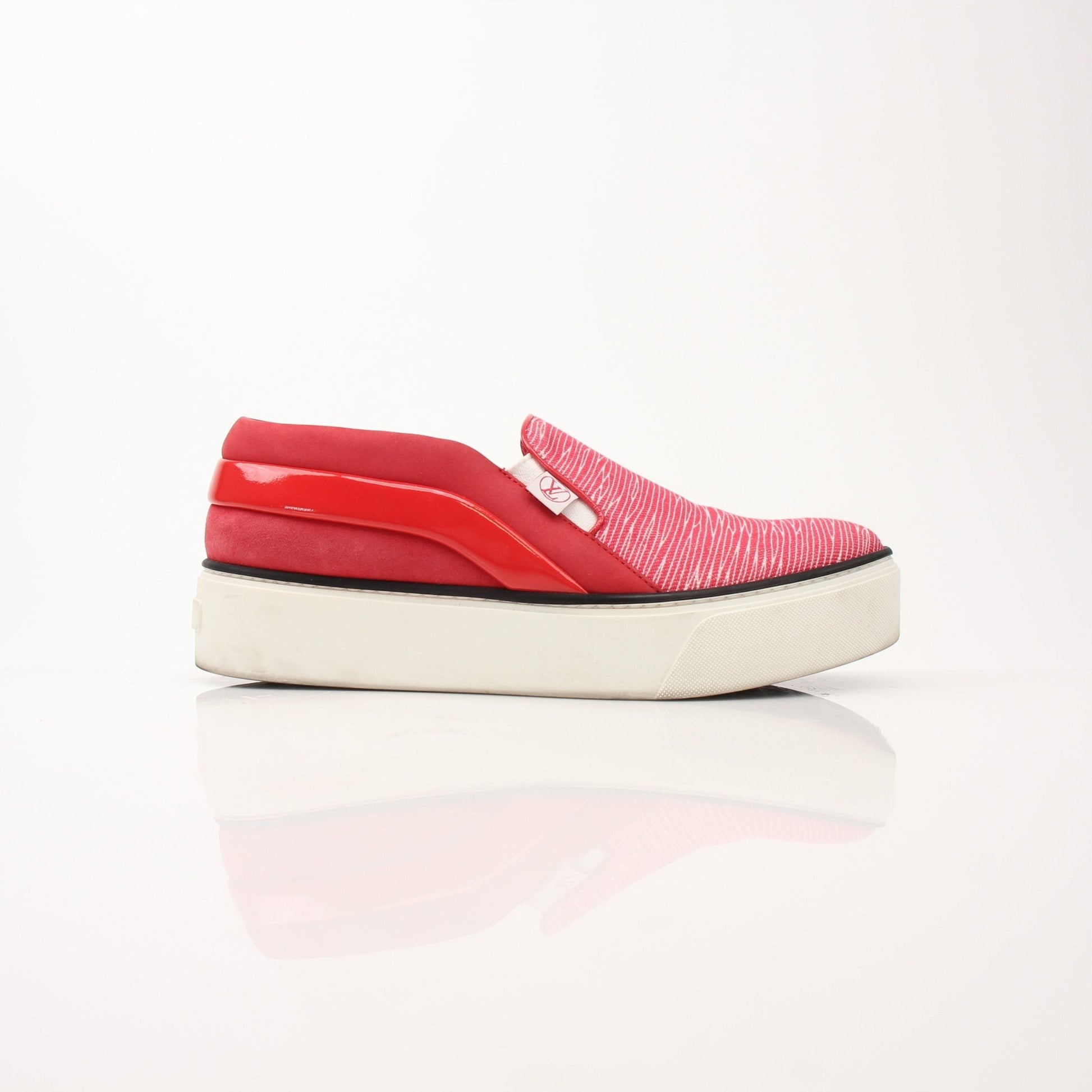 Gold & Beyond Louis Vuitton red slip-on sneakers with sleek design and comfortable fit, shown in the product image.