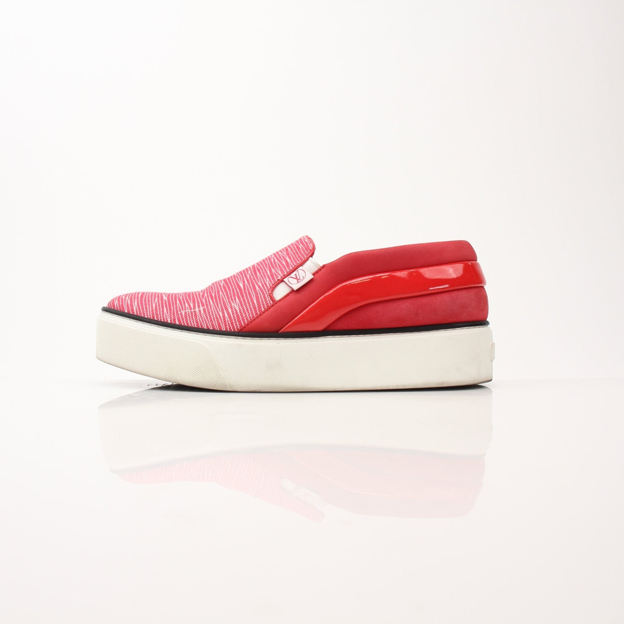 Gold & Beyond Louis Vuitton red slip-on sneakers, stylish shoes with a sleek design and comfortable fit, shown on a white background.