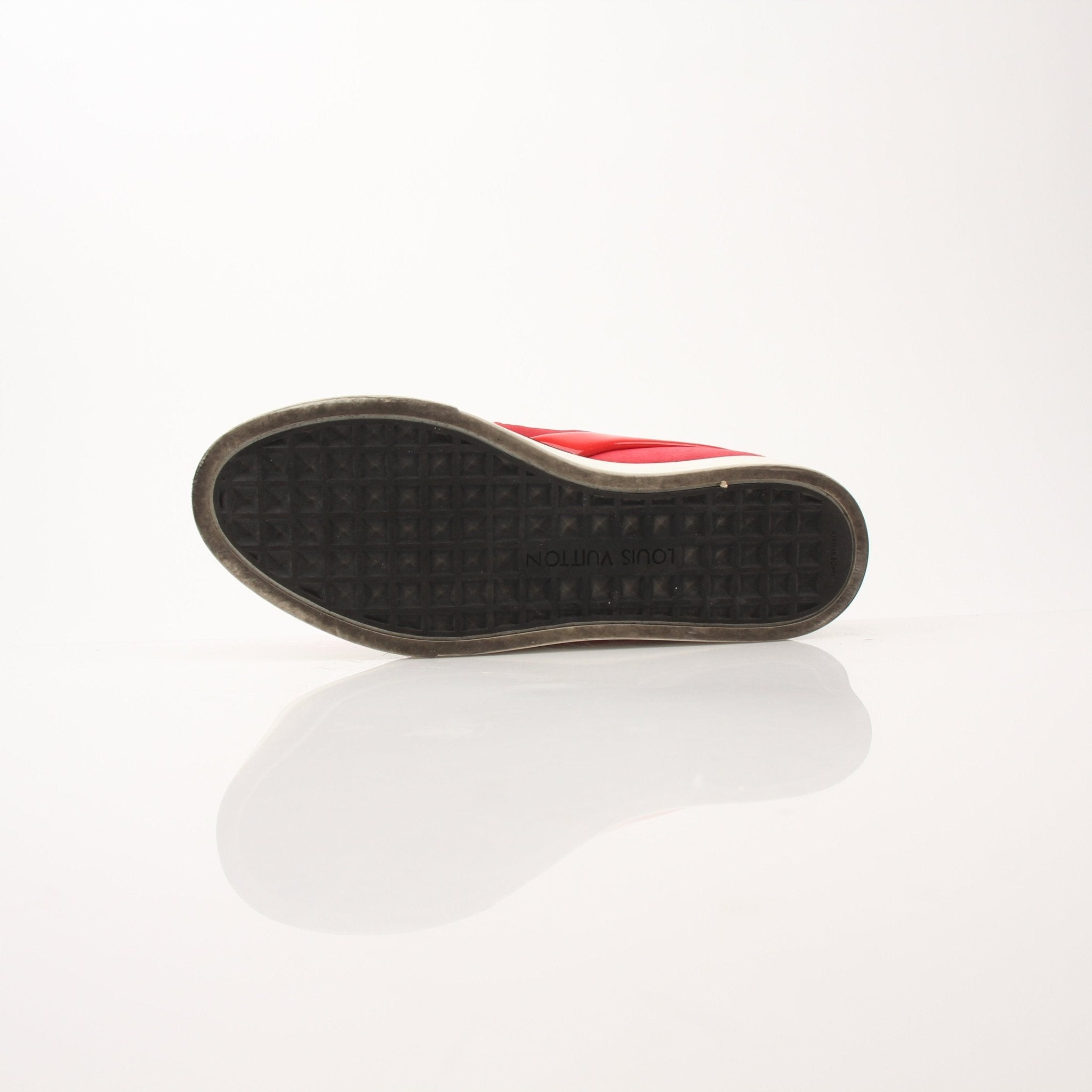 Louis Vuitton red slip-on sneakers by Gold & Beyond, showcasing stylish shoes with sleek design and bold color.