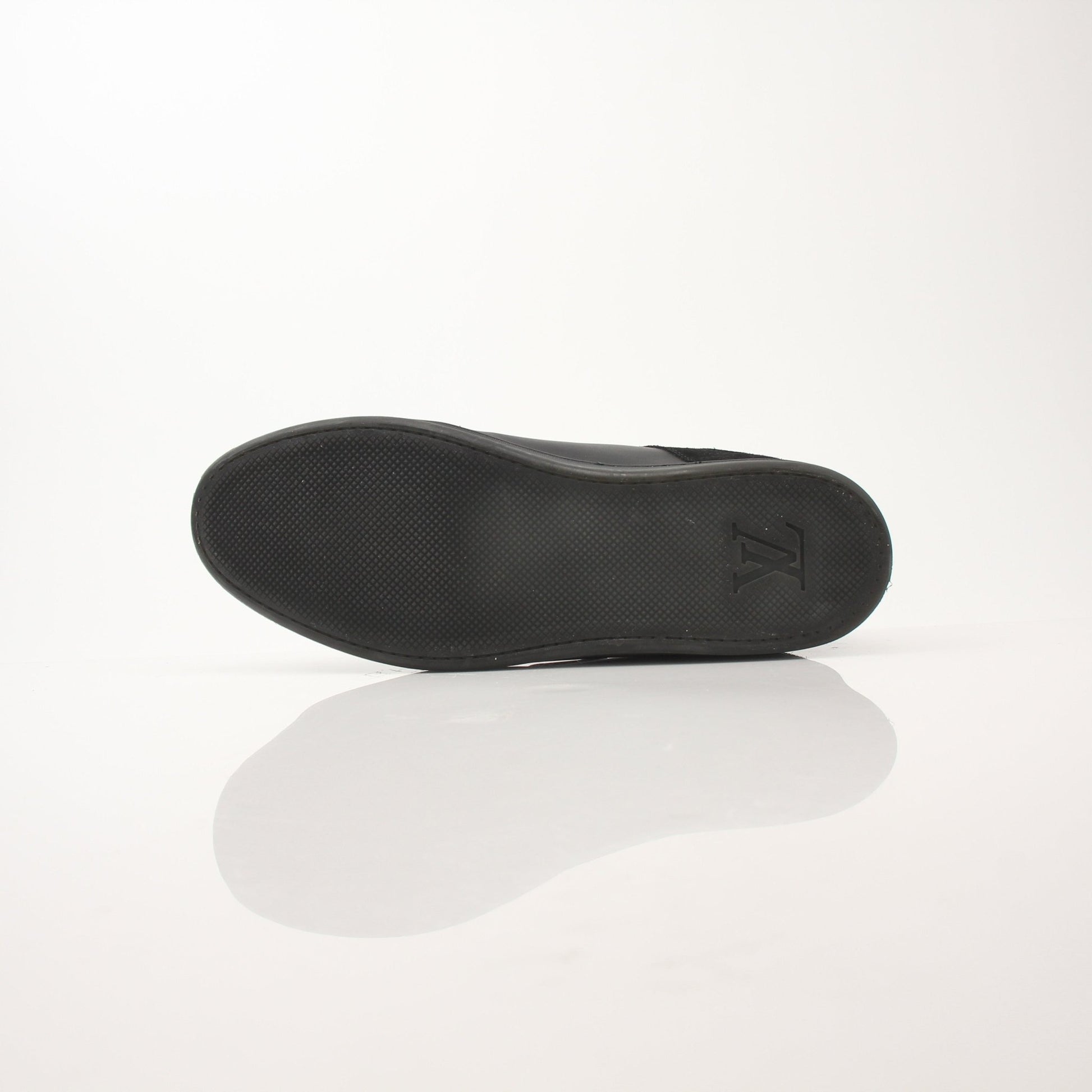 Black Louis Vuitton low top sneakers by Gold & Beyond, featuring stylish design and comfortable shoes for casual wear.