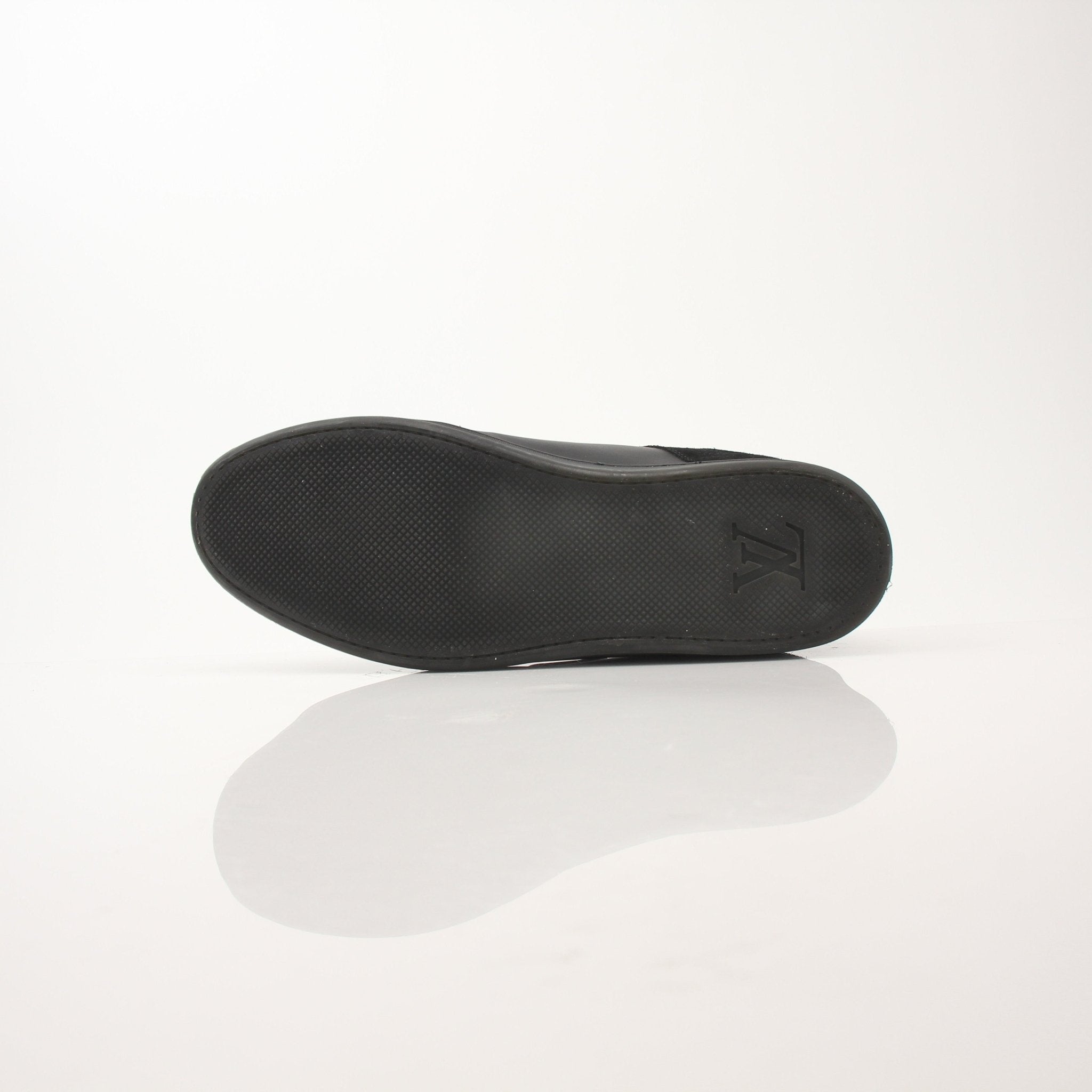 Black Louis Vuitton low top sneakers by Gold & Beyond, featuring stylish design and comfortable shoes for casual wear.