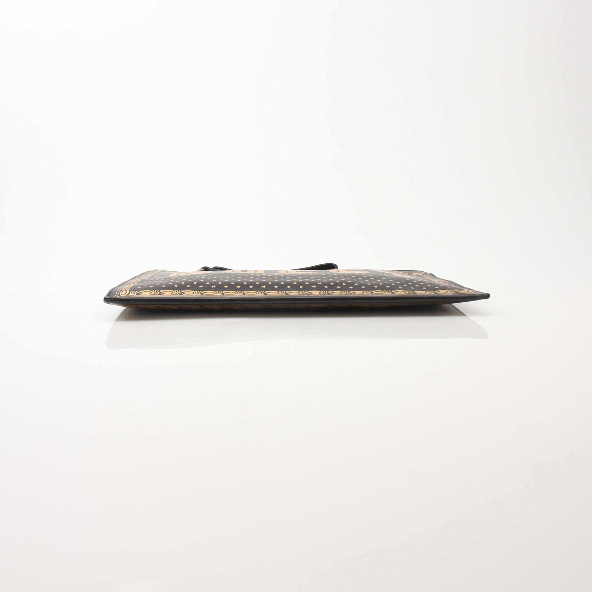 Gucci x SEGA Black Clutch – Gold & Beyond