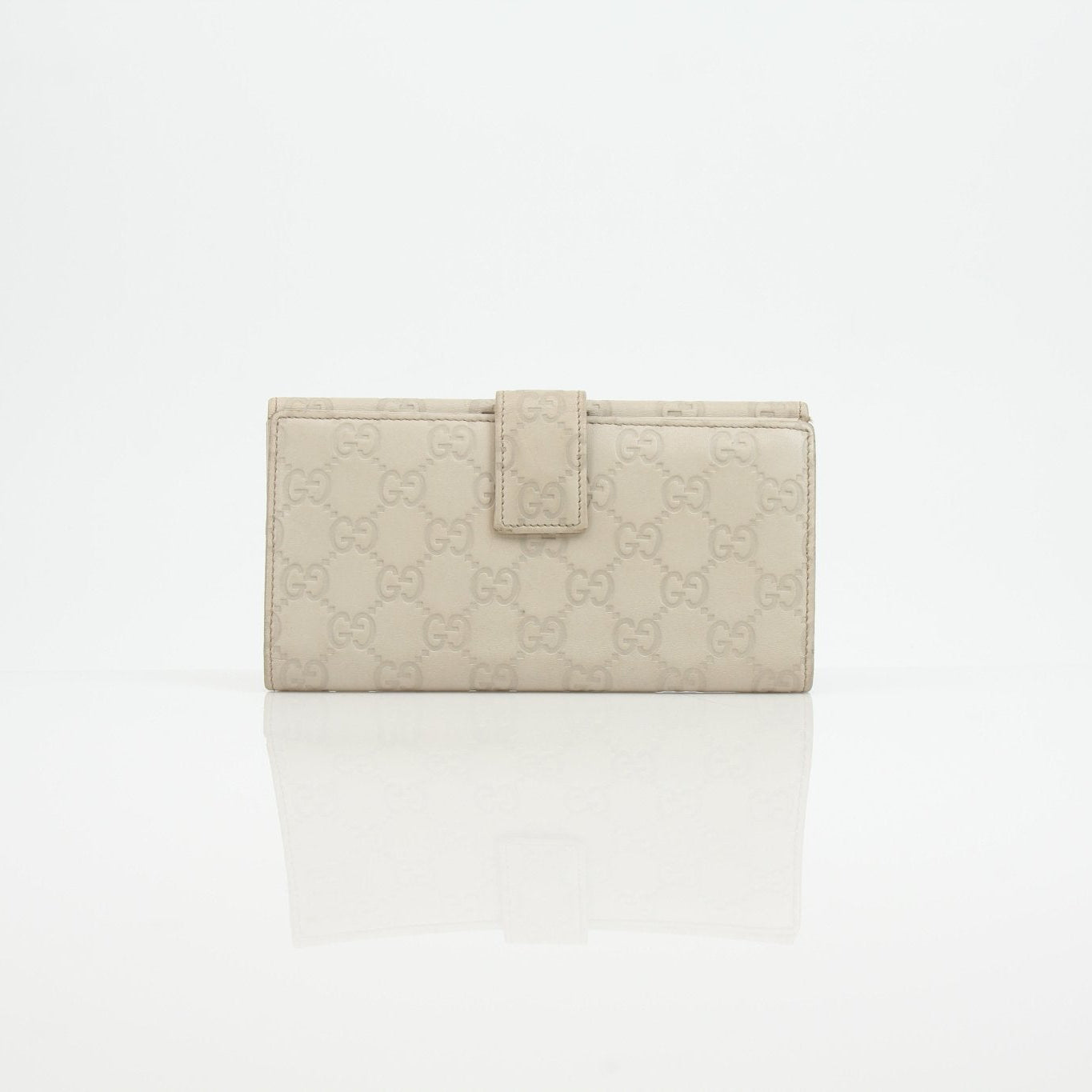 Gold & Beyond Gucci Beige Guccissima Wallet, stylish leather wallet with signature pattern and gold-tone accents.
