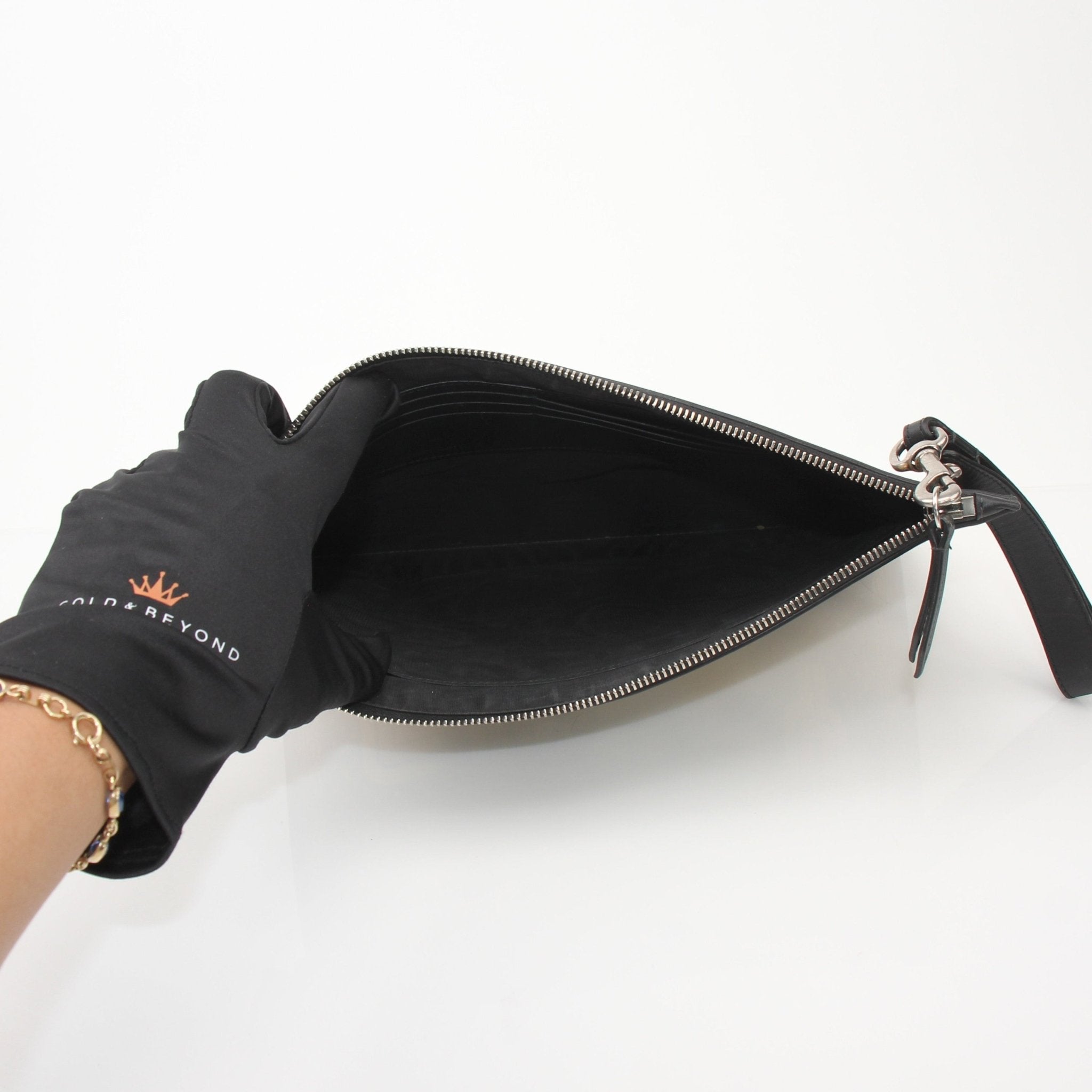 Gucci x SEGA Black Clutch – Gold & Beyond