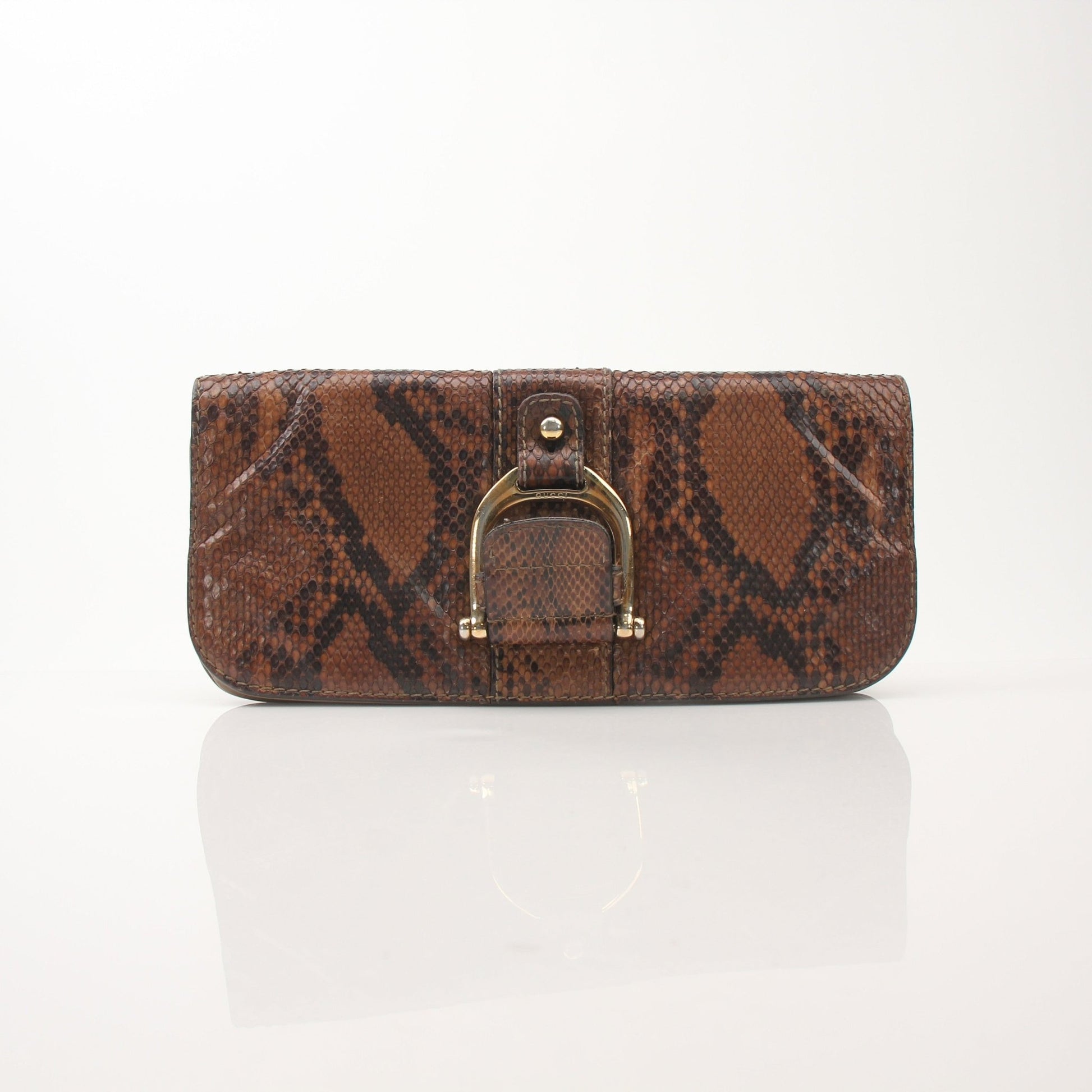 Gucci brown python Greenwich clutch handbag with gold accents, featuring a textured python skin surface and elegant design.