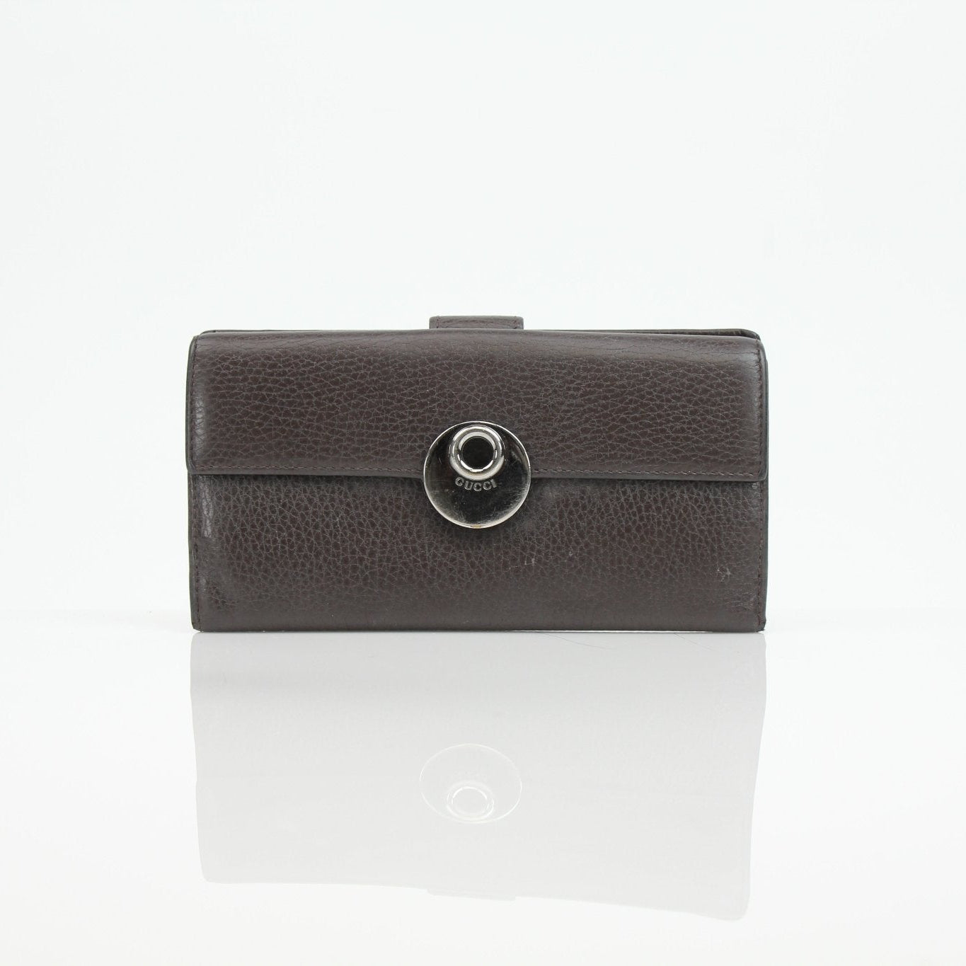 Gucci brown Eclipse wallet with gold accents, featuring multiple card slots and a sleek, compact design for everyday use.