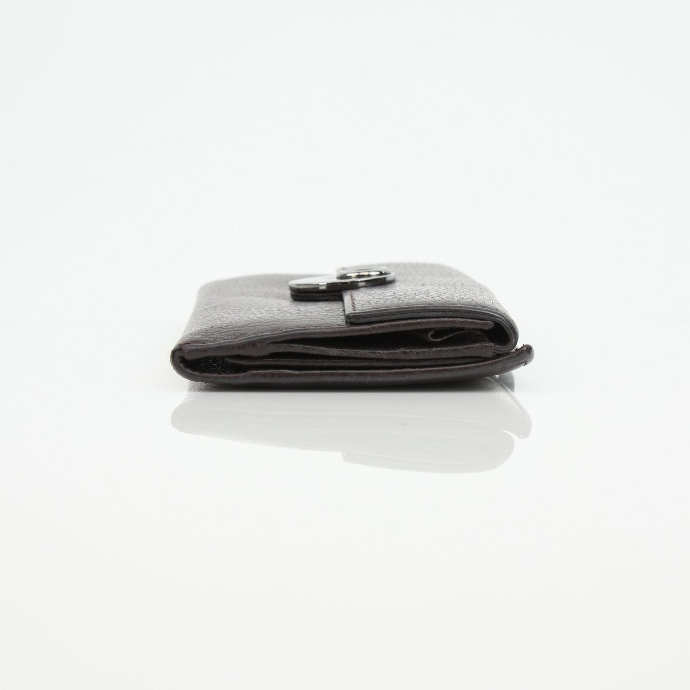 Gucci brown eclipse wallet with gold accents, featuring multiple card slots and a sleek, stylish design.