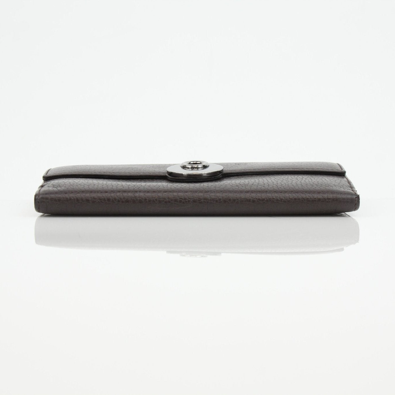 Gucci brown eclipse wallet by Gold & Beyond, featuring a sleek design with gold accents and multiple card slots.