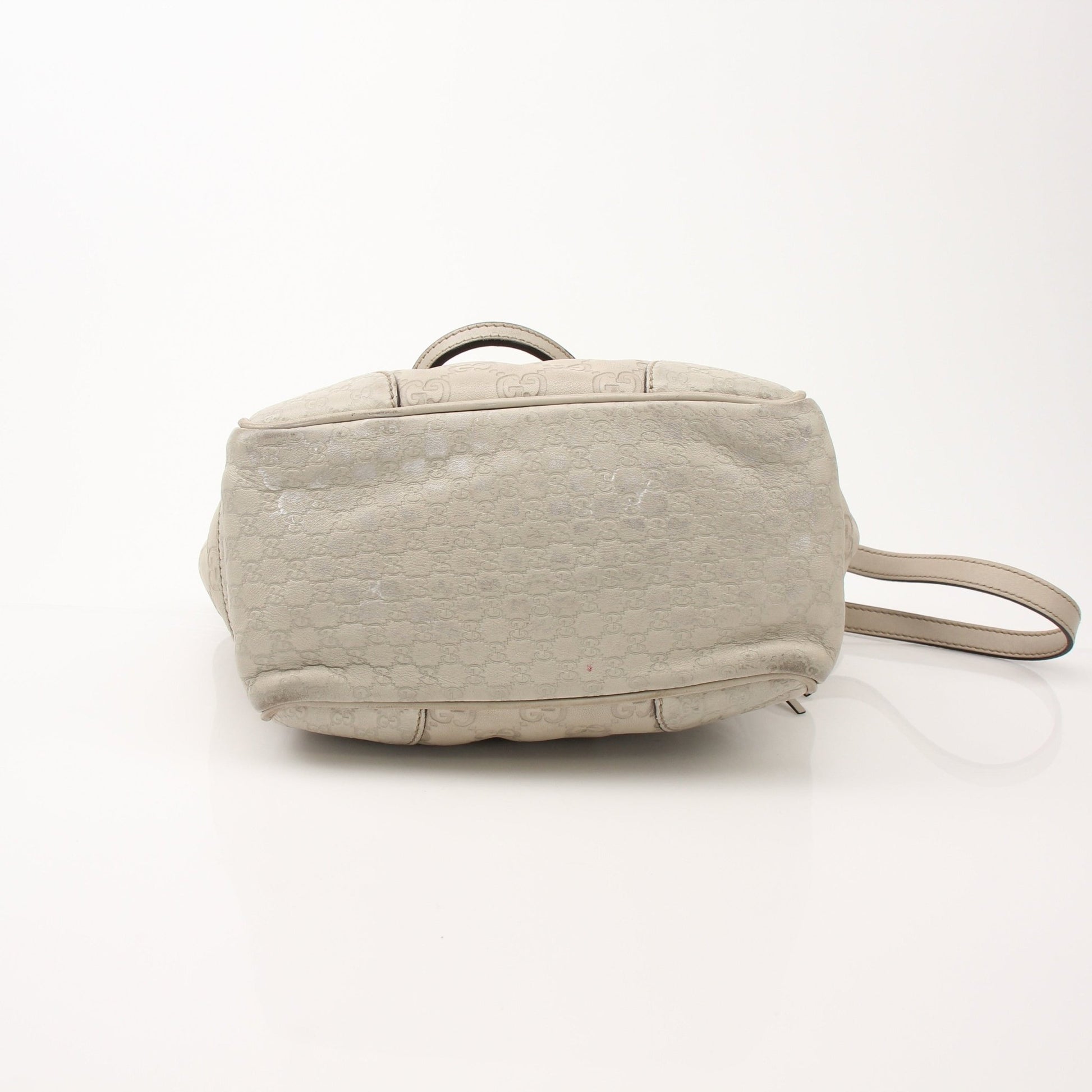 Gucci beige Bree tote handbag by Gold & Beyond, showing the stylish design, handles, and textured beige leather material.