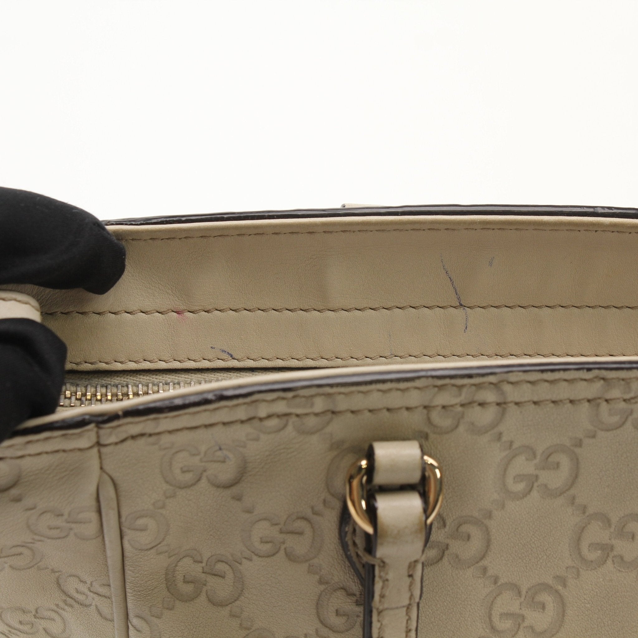 Gold & Beyond Gucci beige Bree tote handbag with structured design and top handles, featuring subtle branding details.