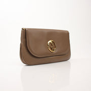 Gucci brown pebbled leather '1973' shoulder handbag with gold accents and a structured design, displayed on a plain background.