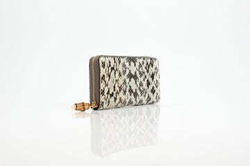 Gucci Soho Python Bamboo Zip-Around Wallet featuring textured python leather and bamboo accents in a stylish design.