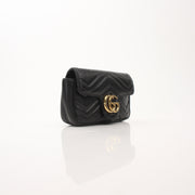 Gold & Beyond Gucci Calfskin Matelassé GG Marmont mini shoulder handbag with quilted design and gold-tone hardware.