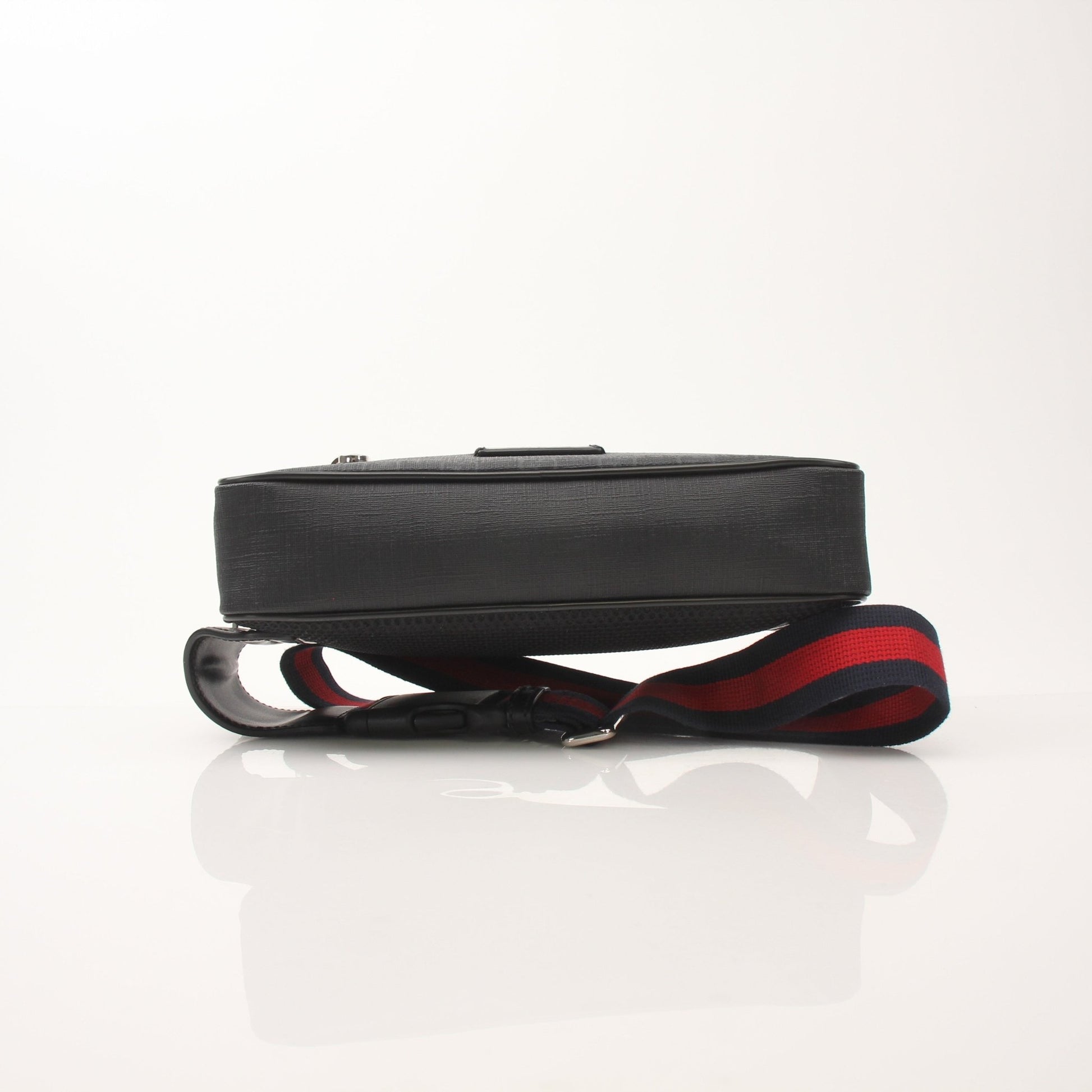 Gucci Web Belt Bag handbag with adjustable strap and signature green and red Web design, by Gold & Beyond.