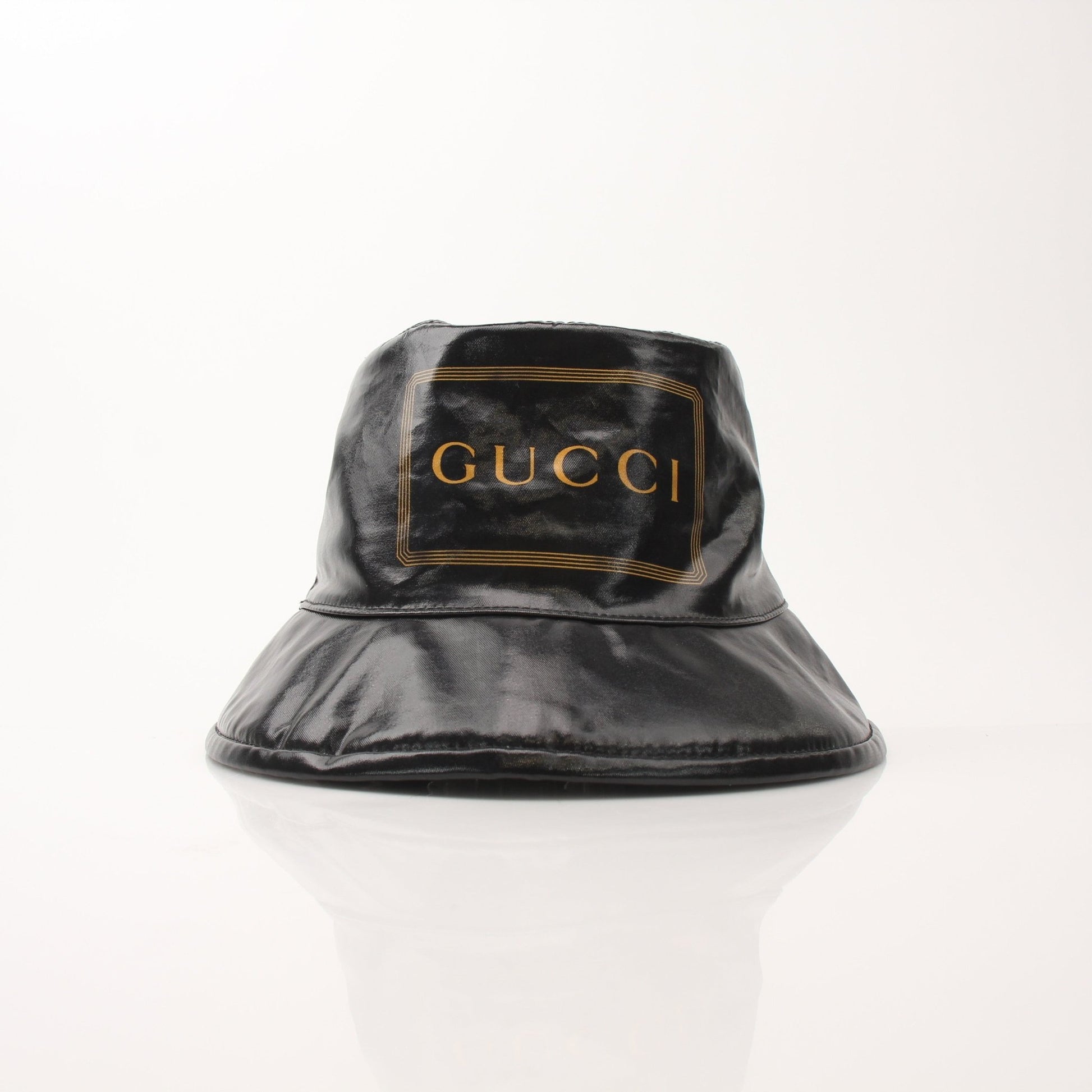 Gucci coated canvas Monte Carlo bucket hat in beige with Gucci logo pattern, stylish accessories for sun protection and fashion