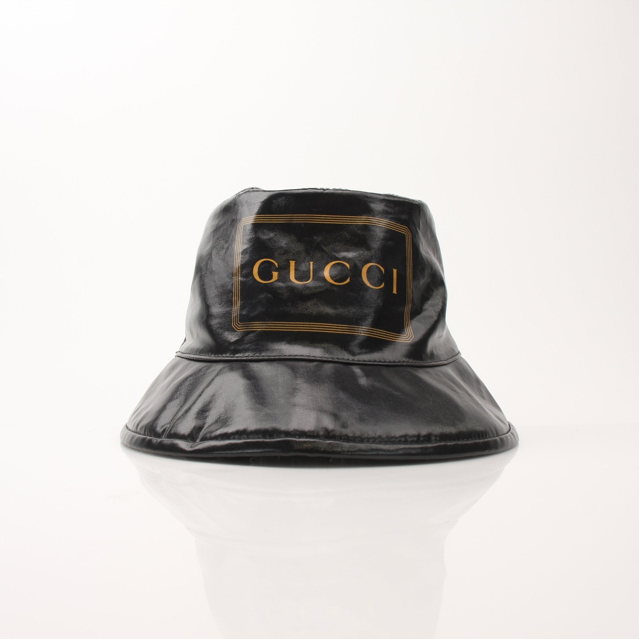 Gucci coated canvas Monte Carlo bucket hat in beige with Gucci logo pattern, stylish accessories for sun protection and fashion