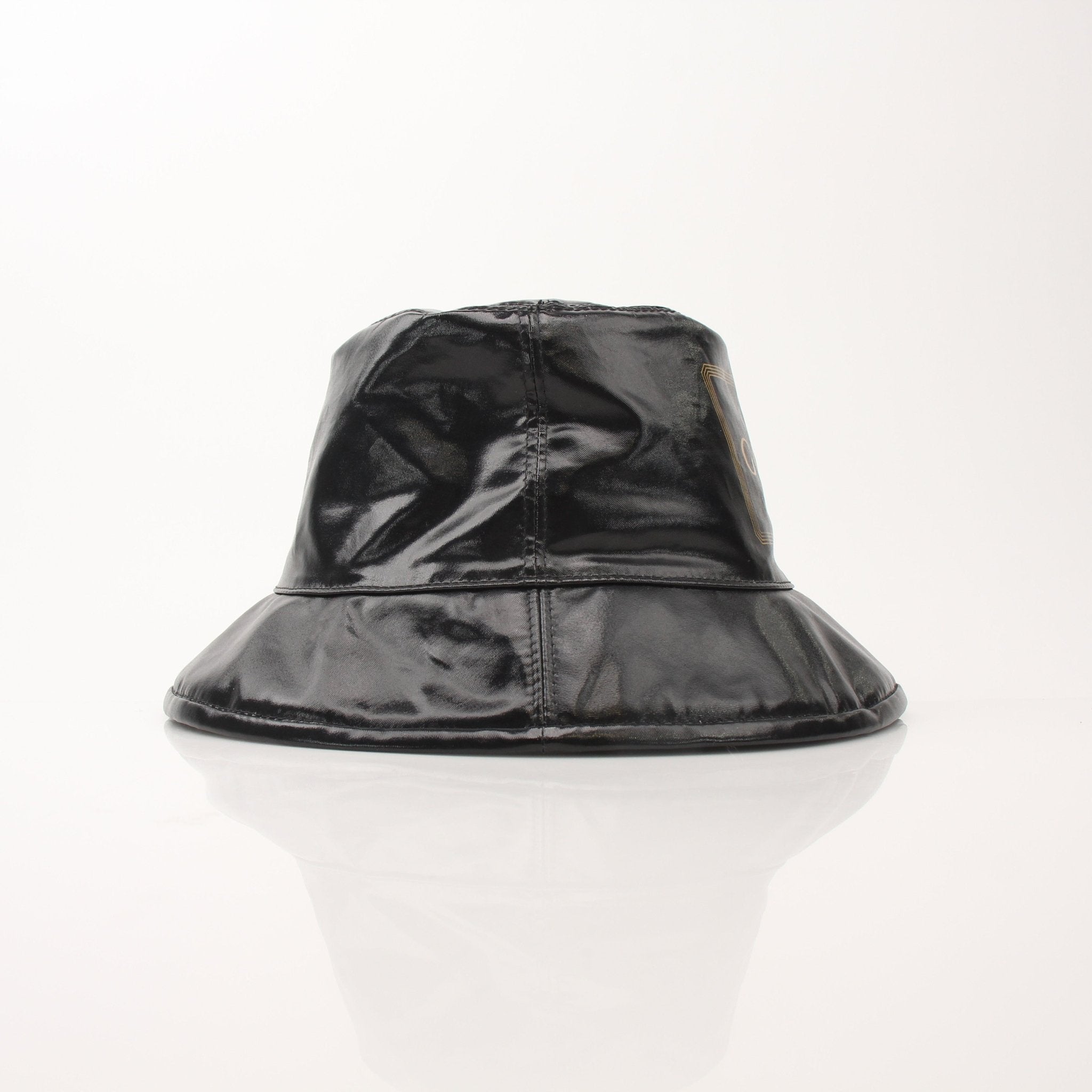 Gucci coated canvas Monte Carlo bucket hat, beige and brown accessories with Gucci logo, stylish and sun protection.