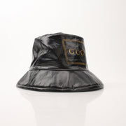 Gucci coated canvas Monte Carlo bucket hat with wide brim and stylish design, part of Gold & Beyond accessories collection.
