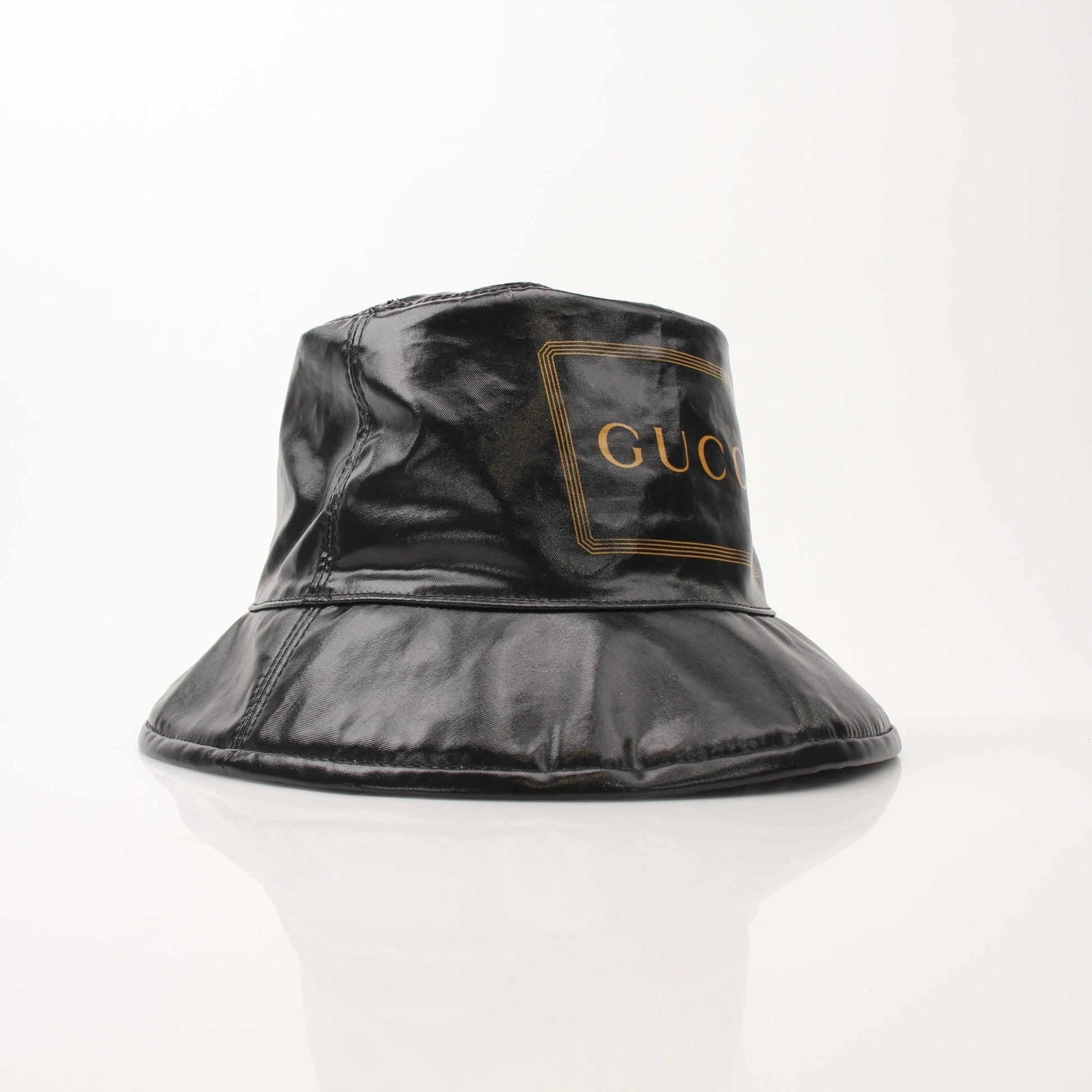 Gucci coated canvas Monte Carlo bucket hat with wide brim and stylish design, part of Gold & Beyond accessories collection.