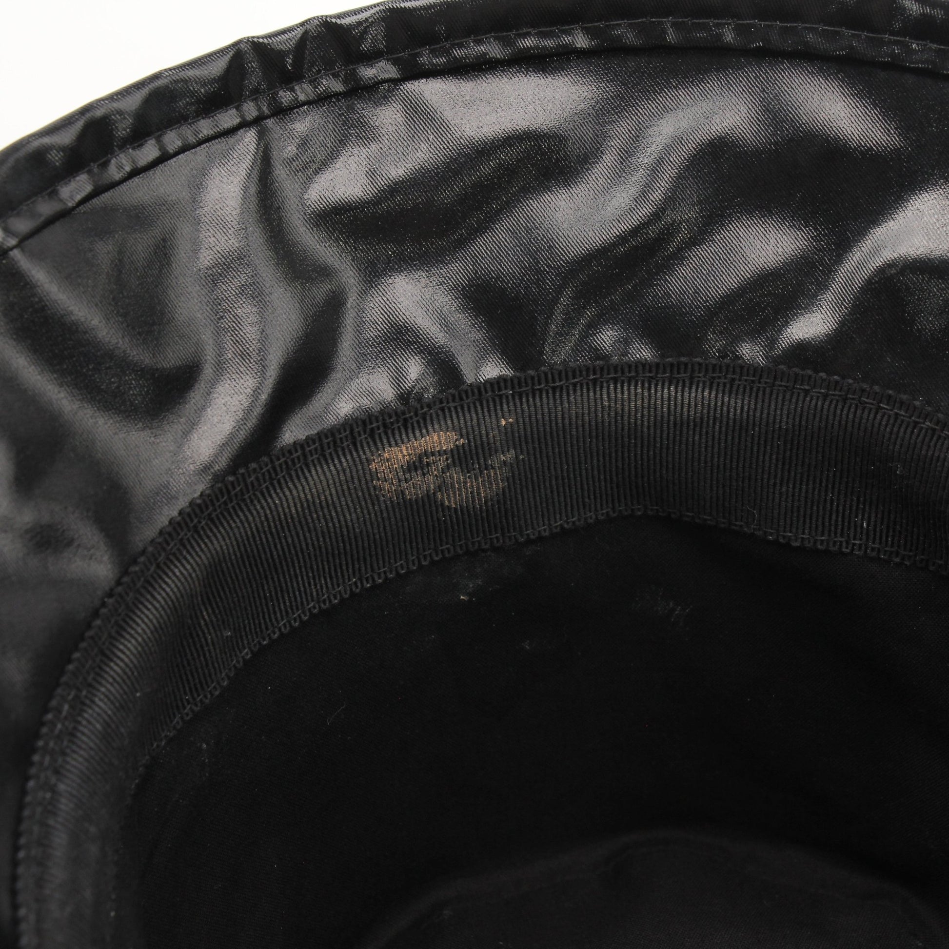 Gucci Coated Canvas Monte Carlo Bucket Hat in beige with Gucci logo, stylish accessory for sun protection and fashion.