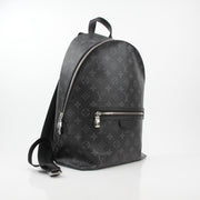 Louis Vuitton Black Monogram Eclipse Discovery Backpack PM for travel, featuring sleek design and spacious compartments.