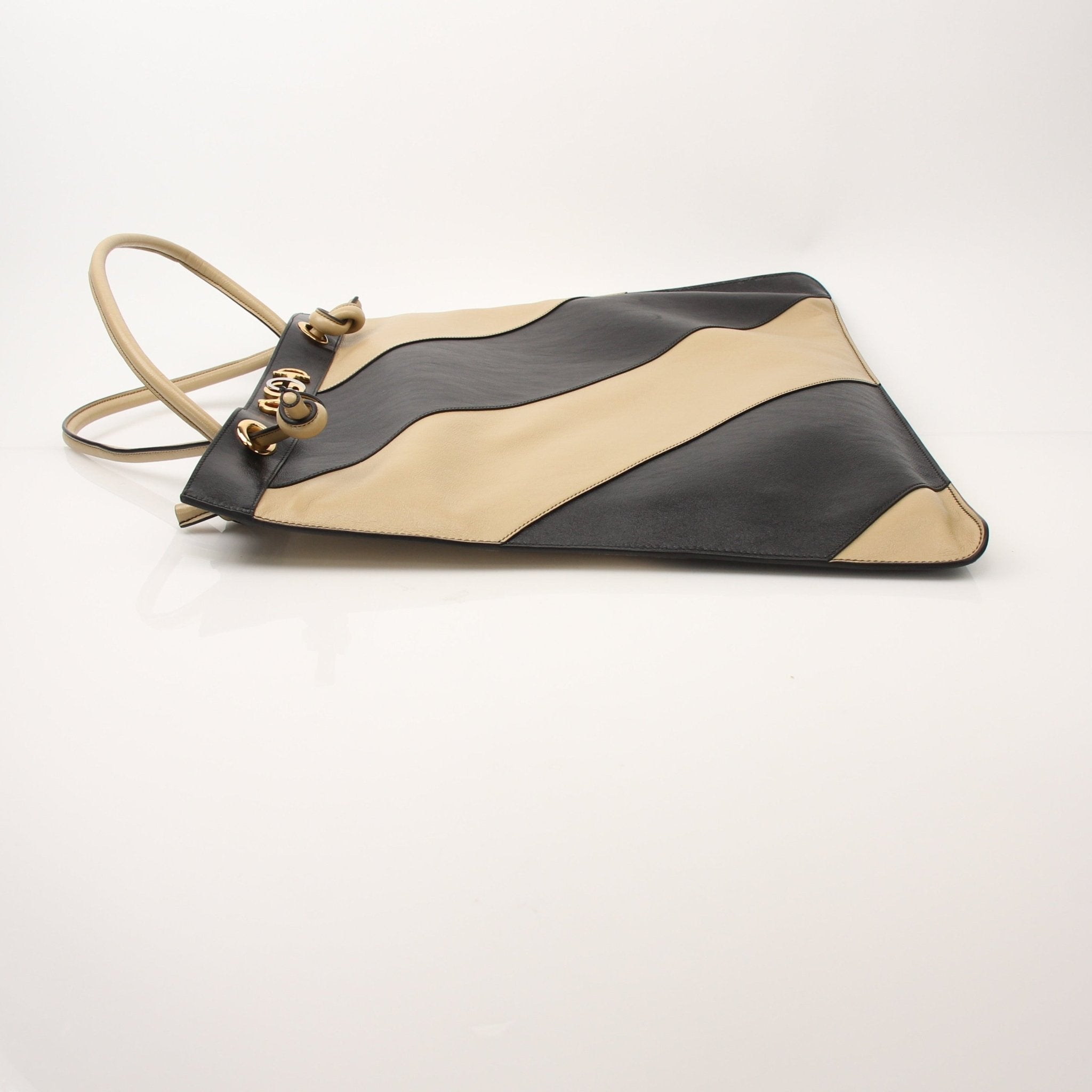 Gold & Beyond Gucci Zumi Tote Bag, stylish handbag with sleek design and gold accents, front view showing handles and logo details.