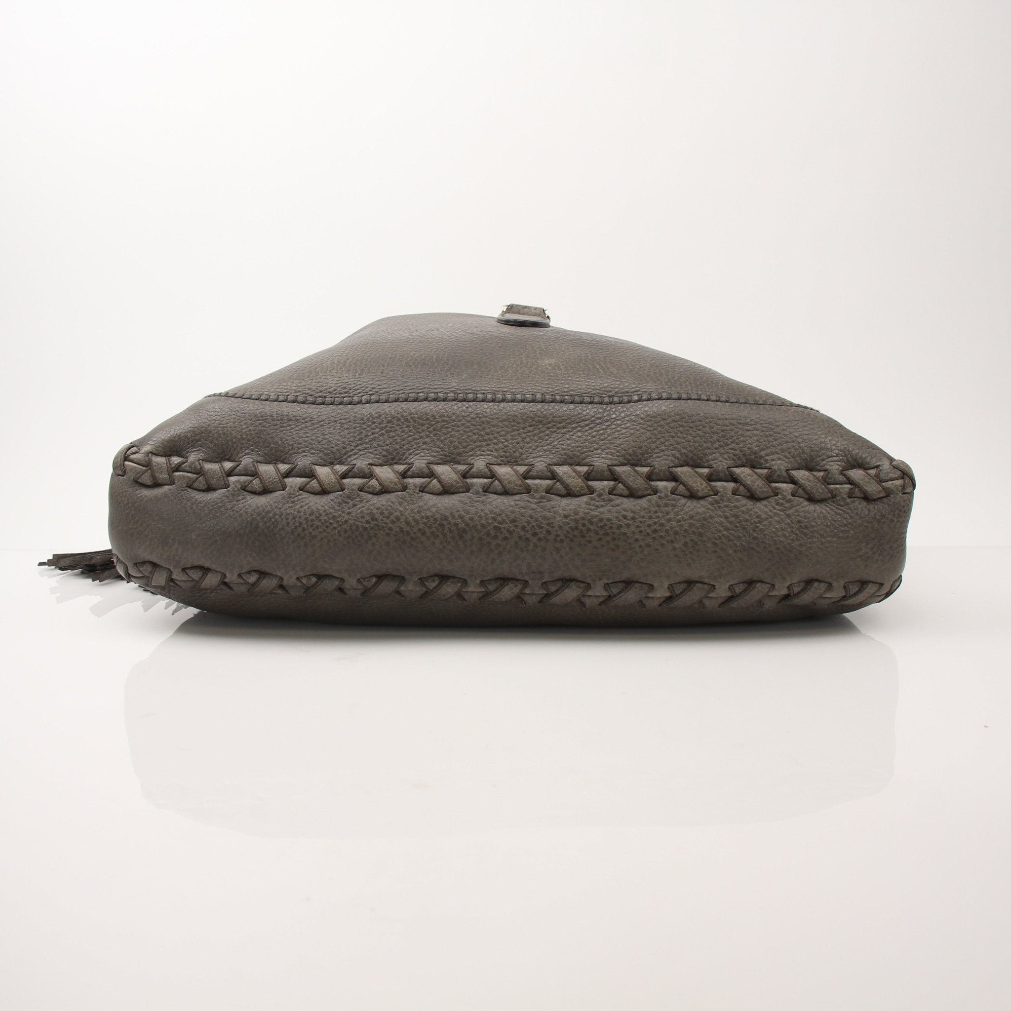 Gucci Pebbled Calfskin Jackie Shoulder Bag, elegant handbag with gold hardware and textured leather, displayed on a neutral background.