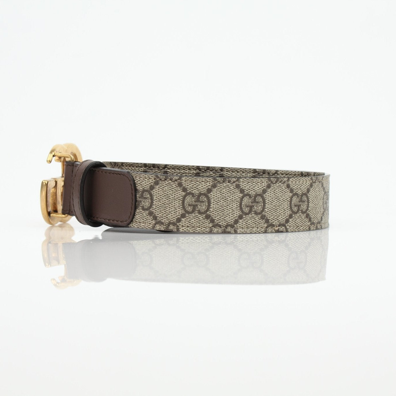 Gucci GG Supreme Double G belt made of fabric and leather with metal buckle, stylish accessories for men and women.