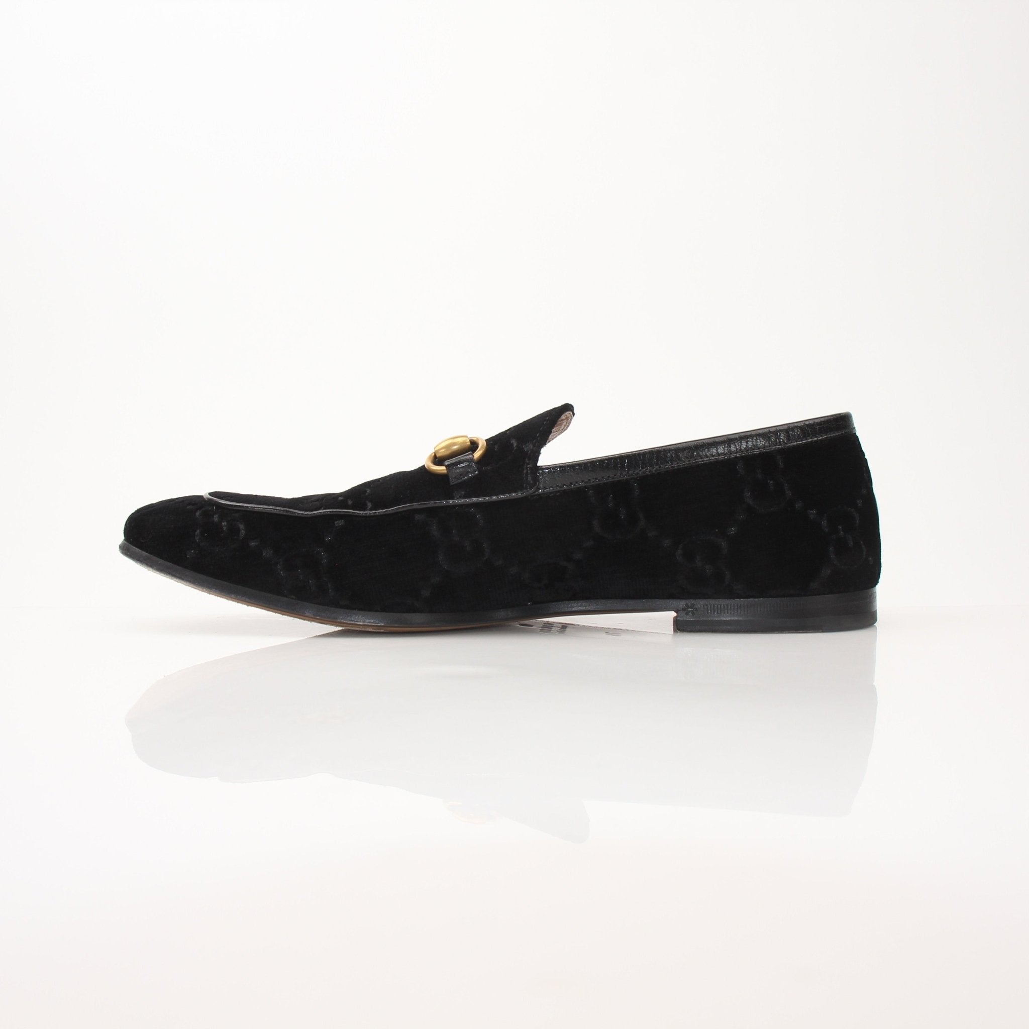 Gold & Beyond men's Gucci Jordaan GG black velvet loafers, stylish shoes with a sleek design and signature branding.