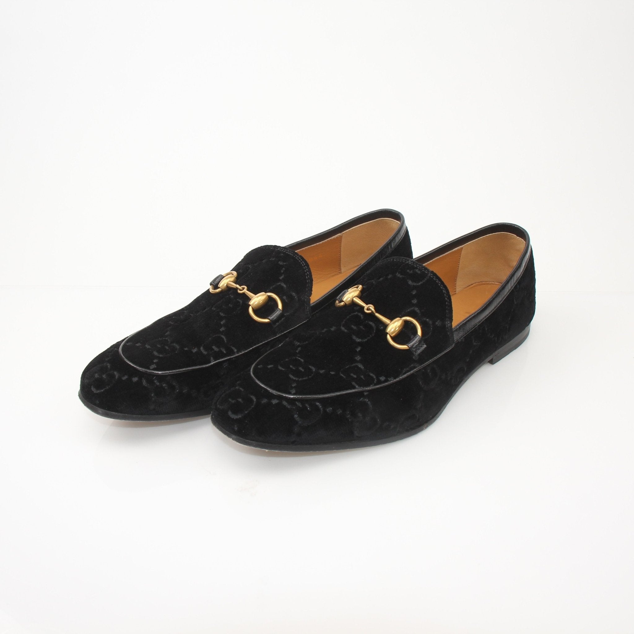 Gold & Beyond Gucci men's Jordaan GG black velvet loafers, stylish slip-on shoes with signature branding and luxurious velvet finish.