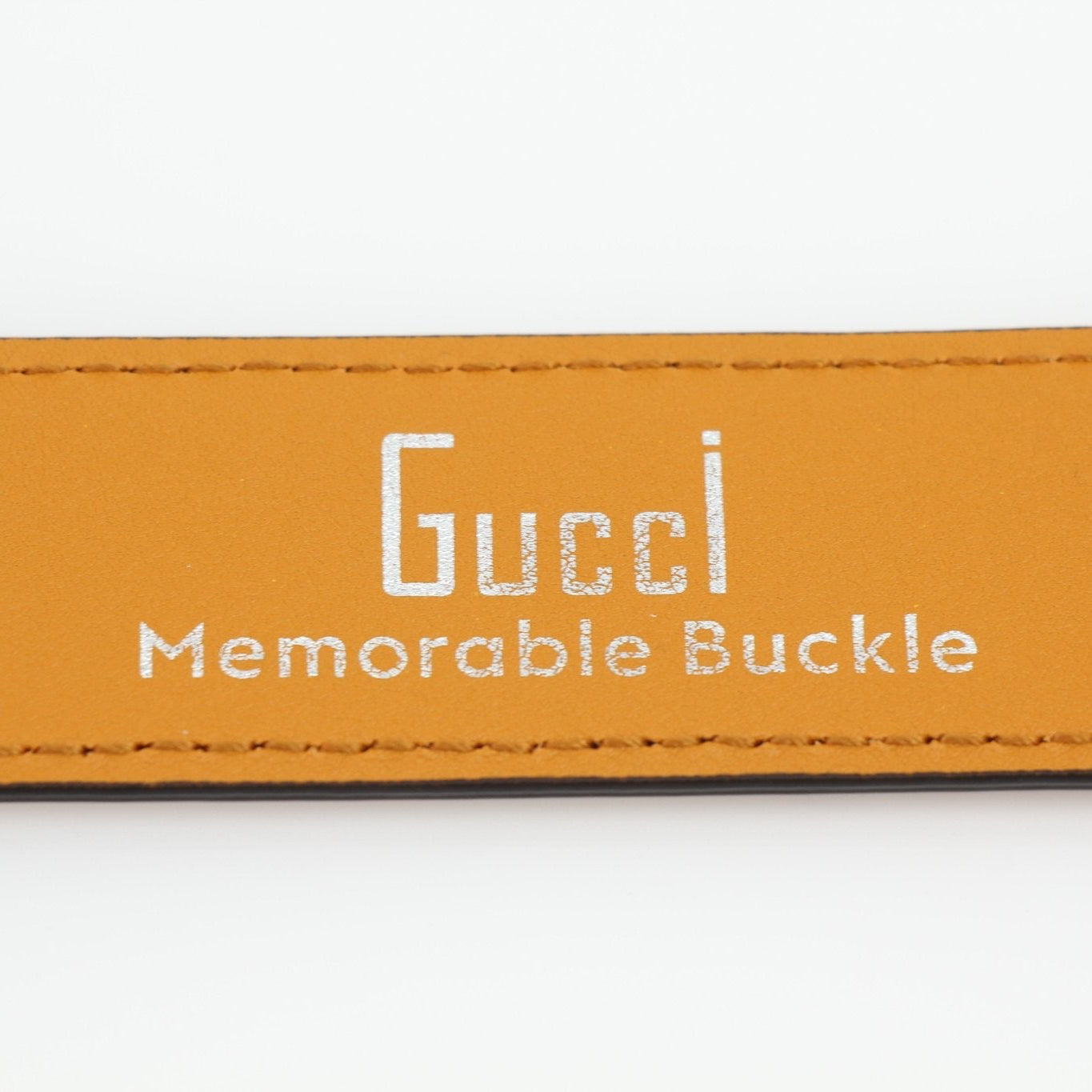Gucci yellow star leather belt, stylish accessories with gold buckle and star design, on a neutral background.