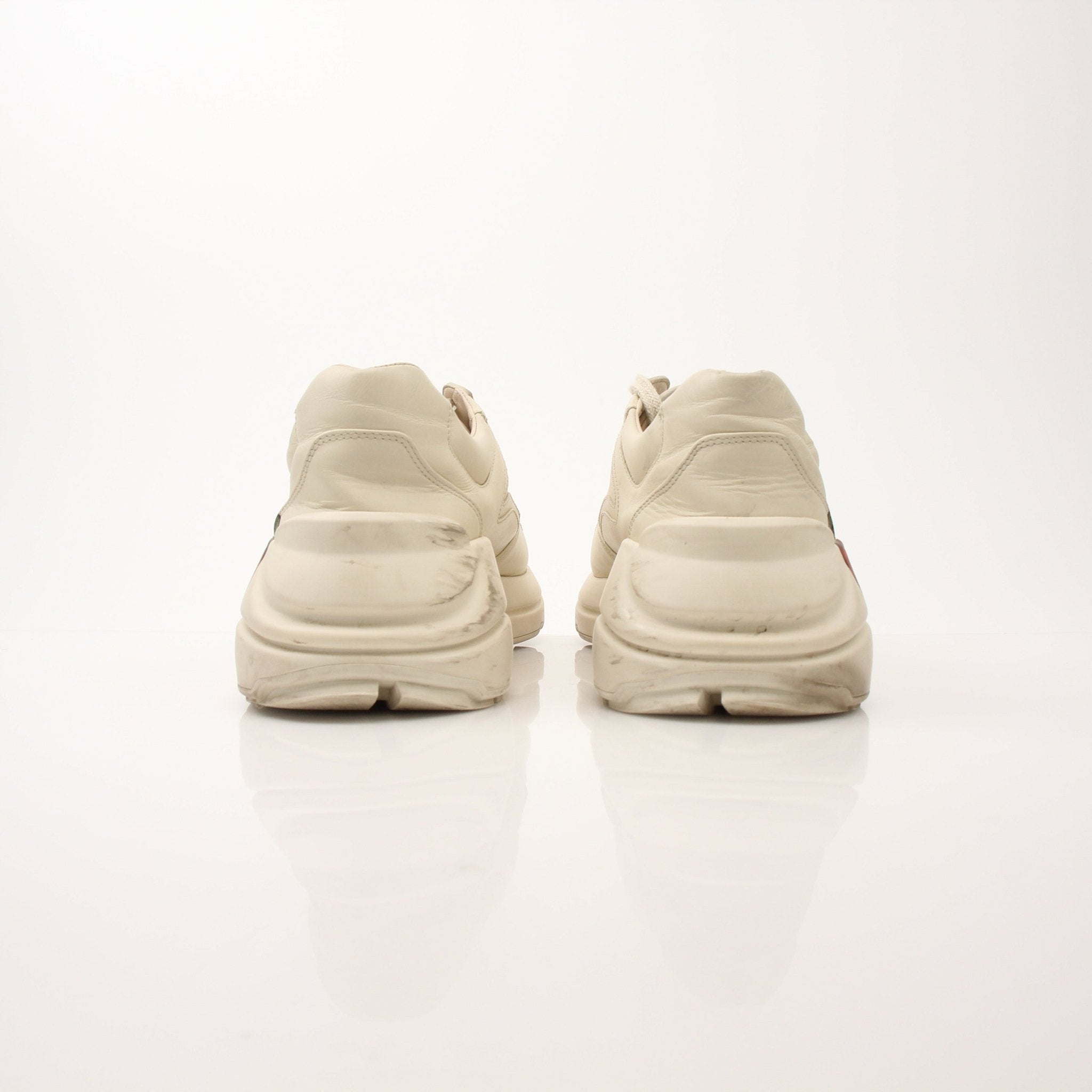 Gucci Women’s Rhyton Strawberry Sneakers in white with red strawberry details, casual sports shoes by Gold & Beyond.