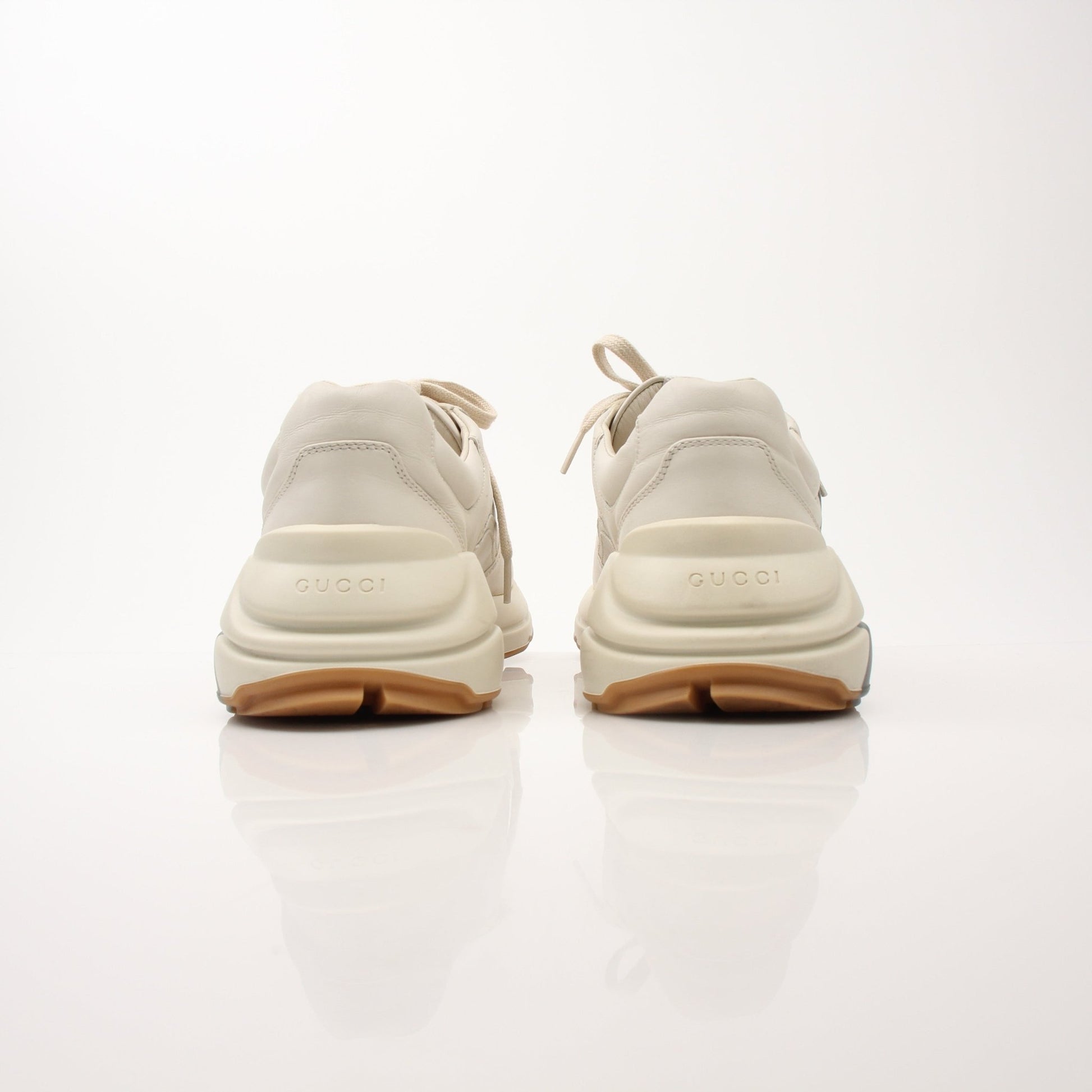 Gucci Men’s Rhyton Web Print Sneakers with logo and colorful web design, casual shoes for men by Gold & Beyond.