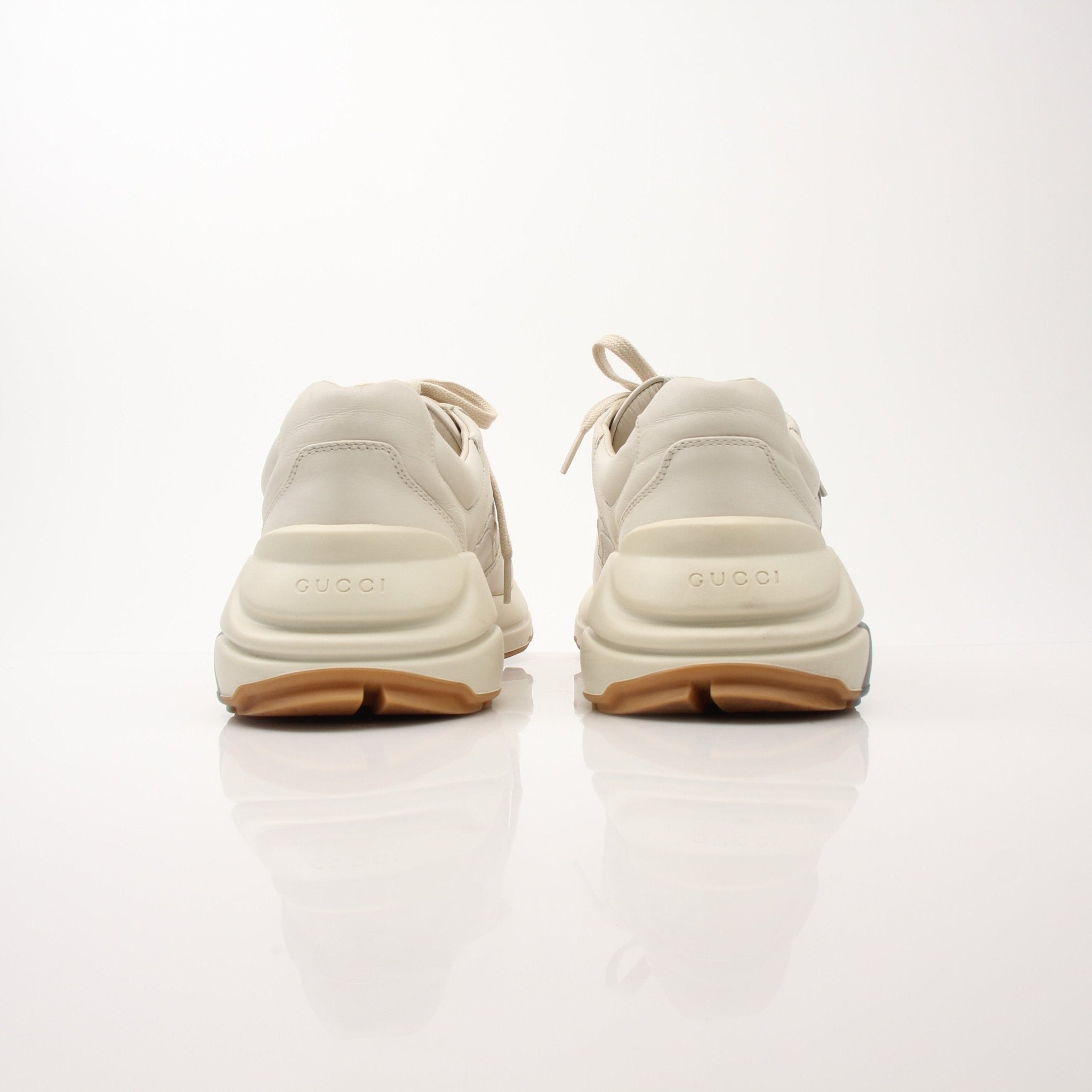 Gucci Men’s Rhyton Web Print Sneakers with logo and colorful web design, casual shoes for men by Gold & Beyond.
