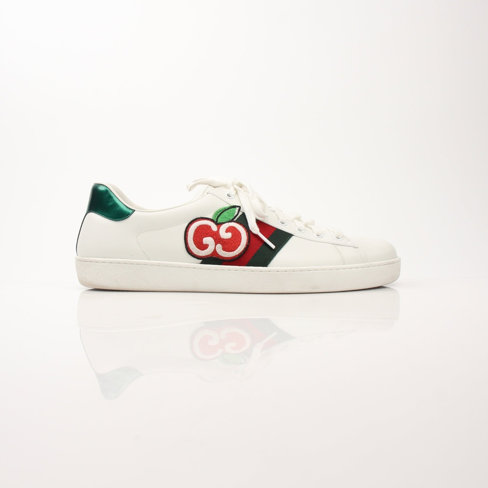 Gold & Beyond Gucci Men’s GG Apple Sneakers, stylish shoes with green and red accents, featuring the iconic GG logo design.